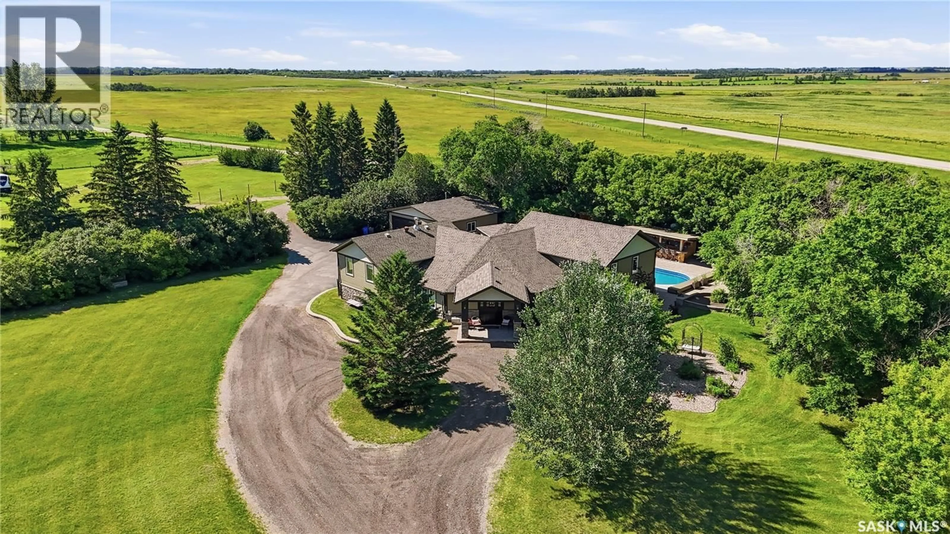 A pic from outside/outdoor area/front of a property/back of a property/a pic from drone, water/lake/river/ocean view for at White City - DOUGLAS ACREAGE, Edenwold Rm No.158 Saskatchewan S4L5B1