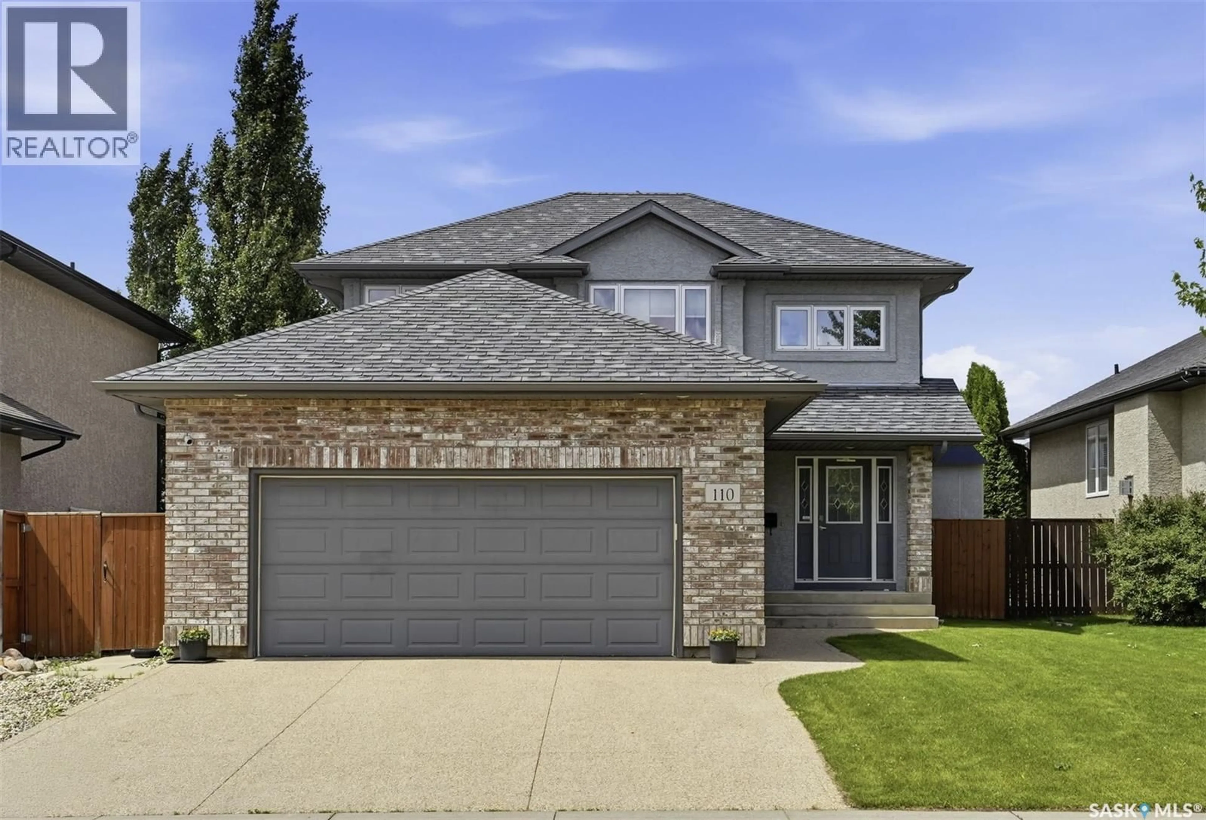 Home with brick exterior material, street for 110 ROBERTSON COVE, Saskatoon Saskatchewan S7T0E3