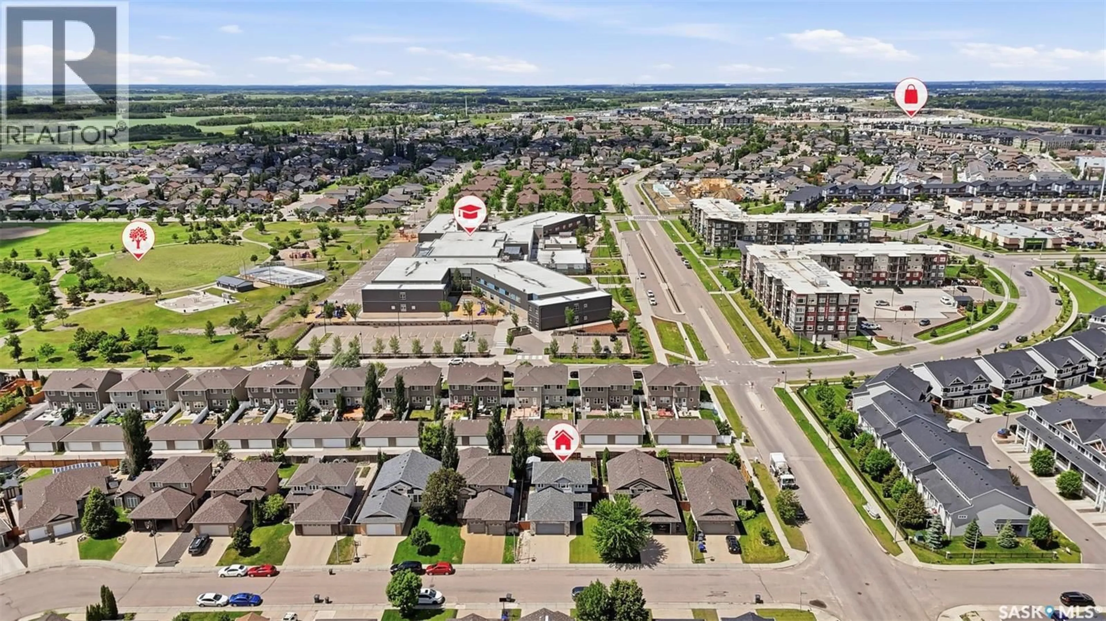 A pic from outside/outdoor area/front of a property/back of a property/a pic from drone, unknown for 110 ROBERTSON COVE, Saskatoon Saskatchewan S7T0E3