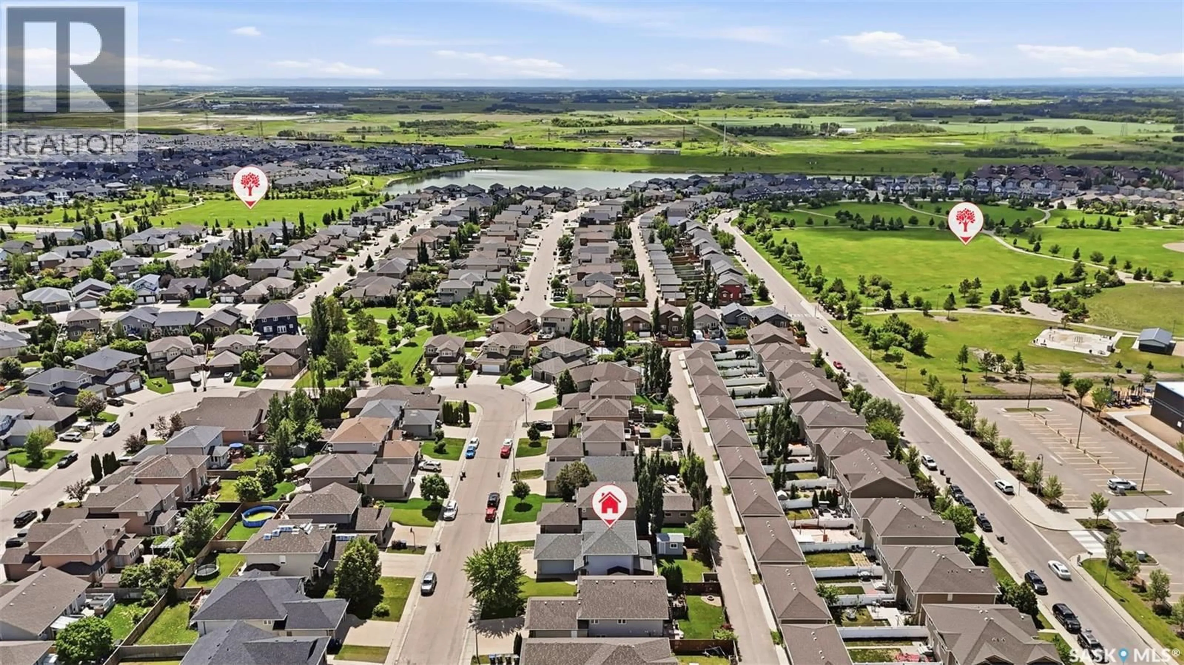 A pic from outside/outdoor area/front of a property/back of a property/a pic from drone, street for 110 ROBERTSON COVE, Saskatoon Saskatchewan S7T0E3