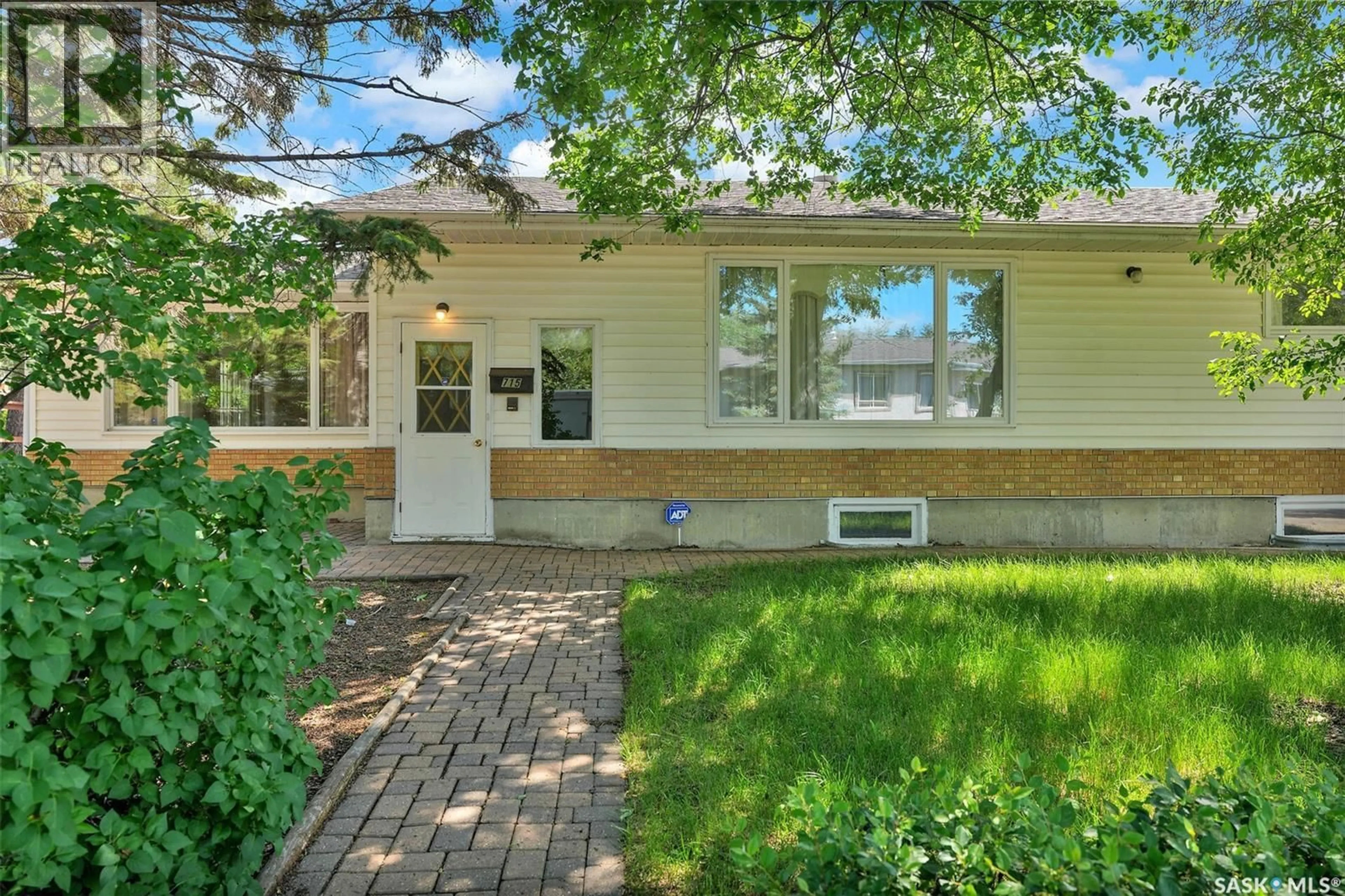 Home with vinyl exterior material, street for 715 CONNAUGHT STREET, Regina Saskatchewan S4T4S5