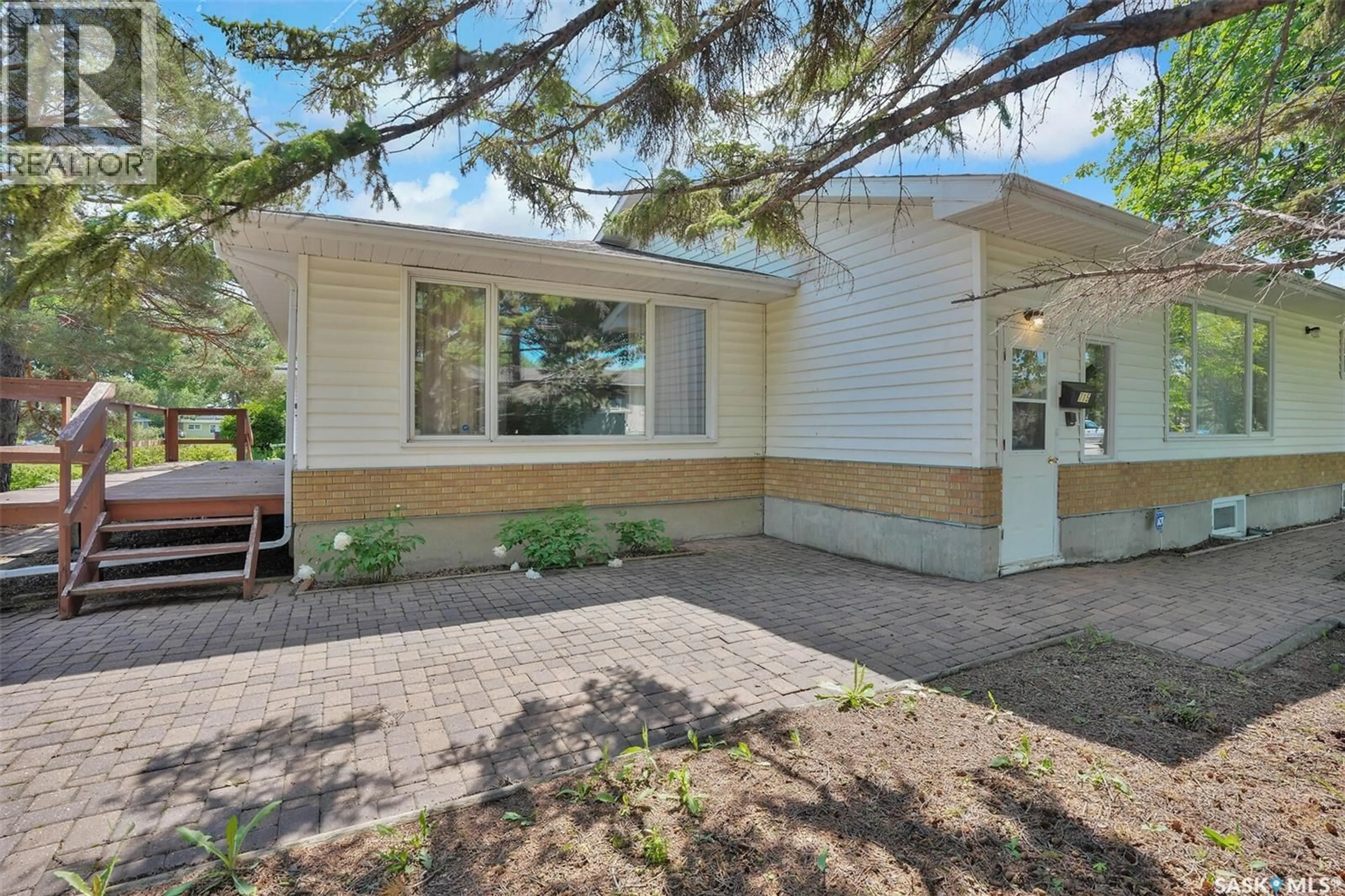 Home with vinyl exterior material, street for 715 CONNAUGHT STREET, Regina Saskatchewan S4T4S5
