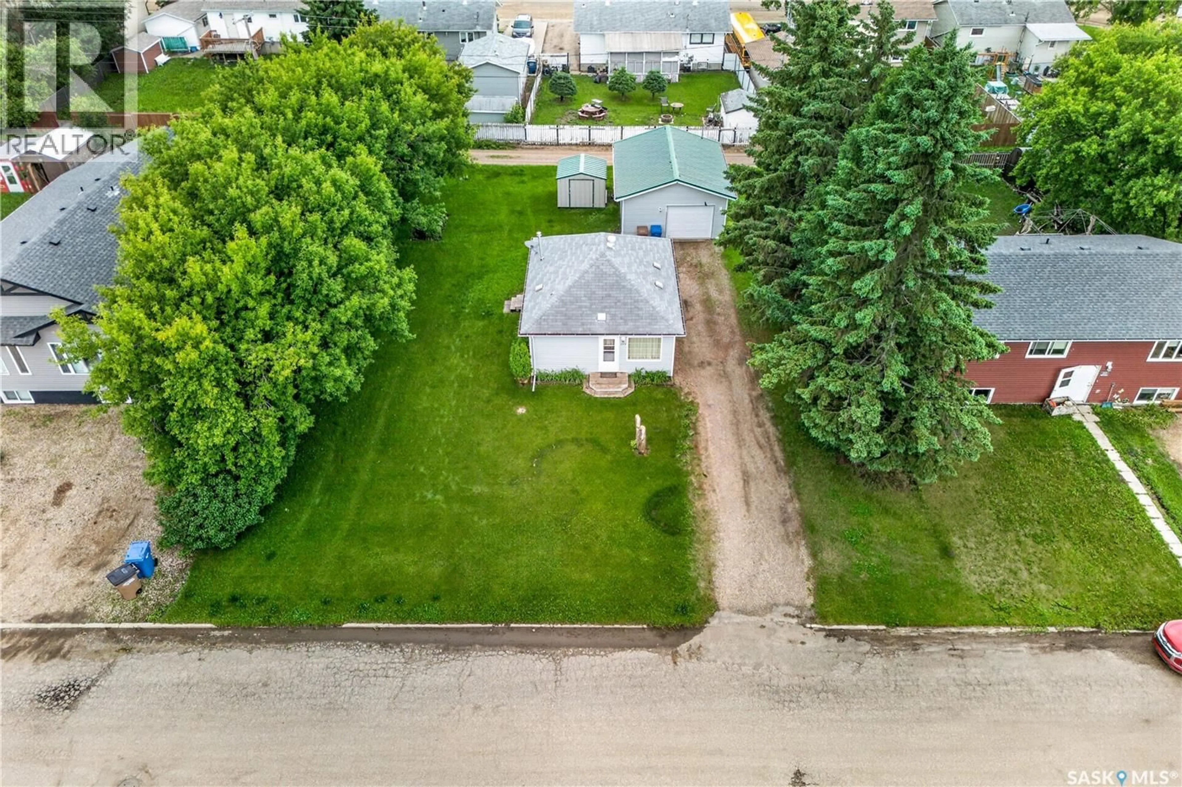 A pic from outside/outdoor area/front of a property/back of a property/a pic from drone, street for 229 LENDRUM STREET, Melfort Saskatchewan S0E1A0