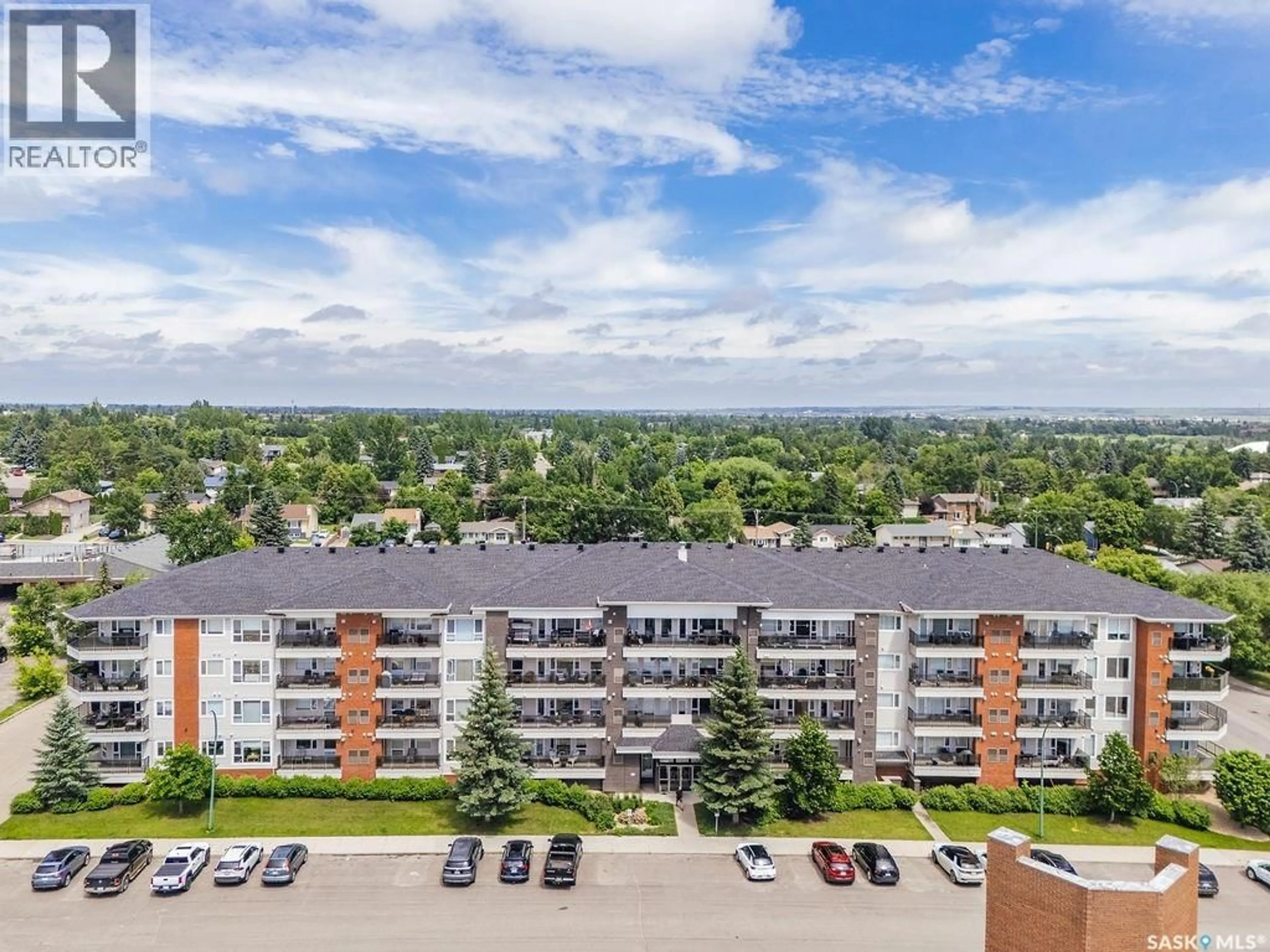 A pic from outside/outdoor area/front of a property/back of a property/a pic from drone, city buildings view from balcony for 102 - 307 KINGSMERE PLACE, Saskatoon Saskatchewan S7J2K3