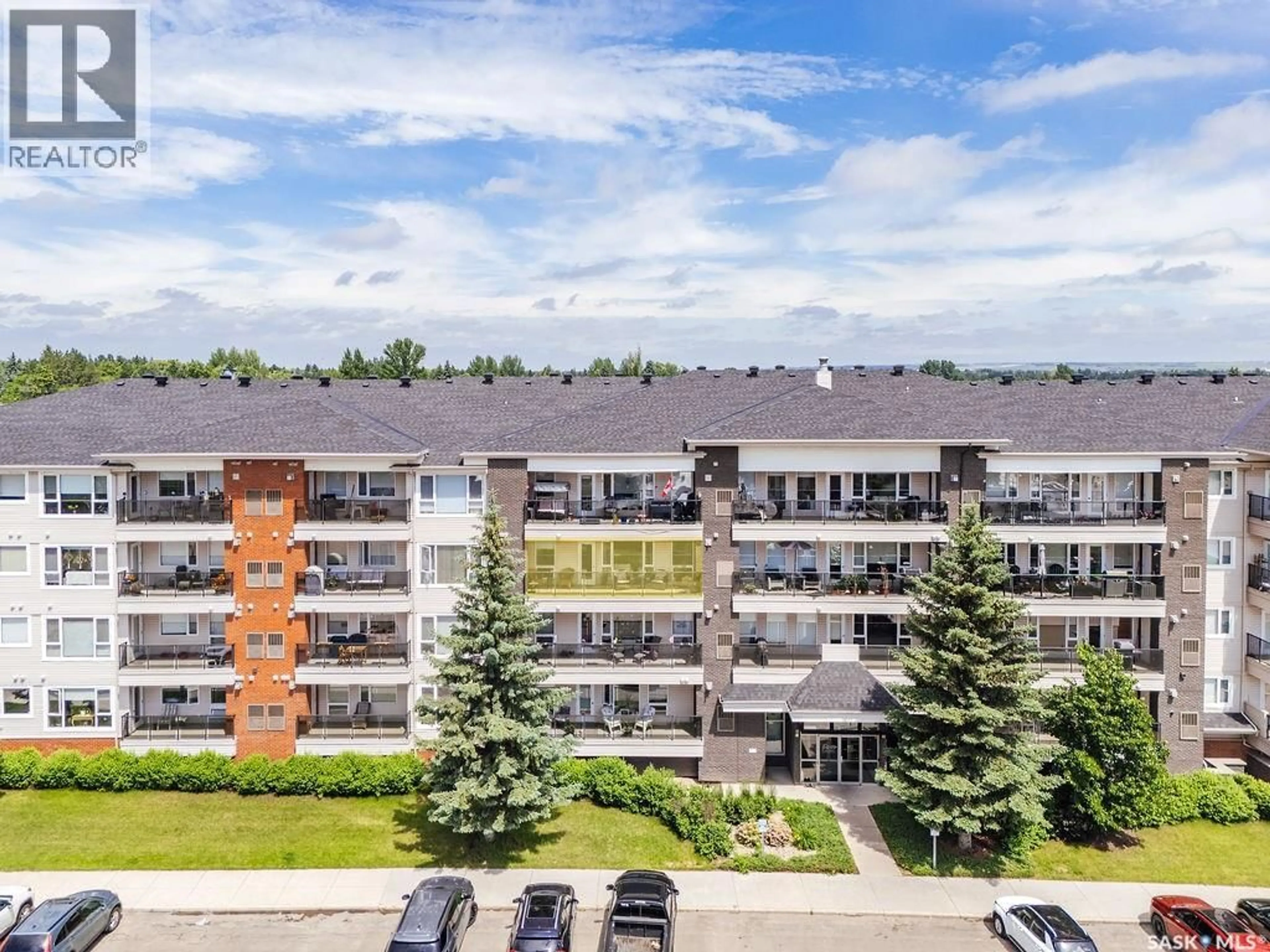A pic from outside/outdoor area/front of a property/back of a property/a pic from drone, city buildings view from balcony for 102 - 307 KINGSMERE PLACE, Saskatoon Saskatchewan S7J2K3