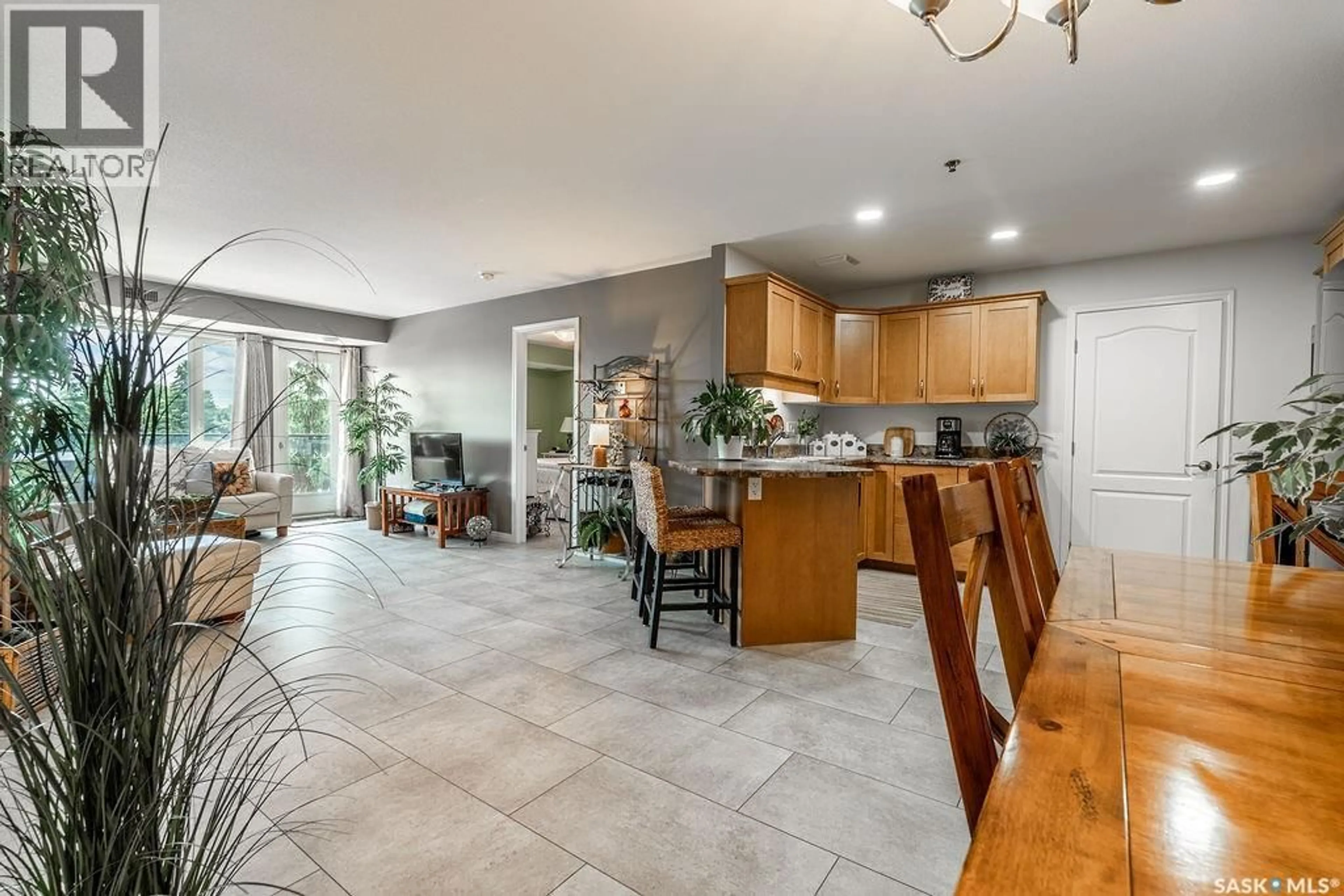 Open concept kitchen, ceramic/tile floor for 102 - 307 KINGSMERE PLACE, Saskatoon Saskatchewan S7J2K3