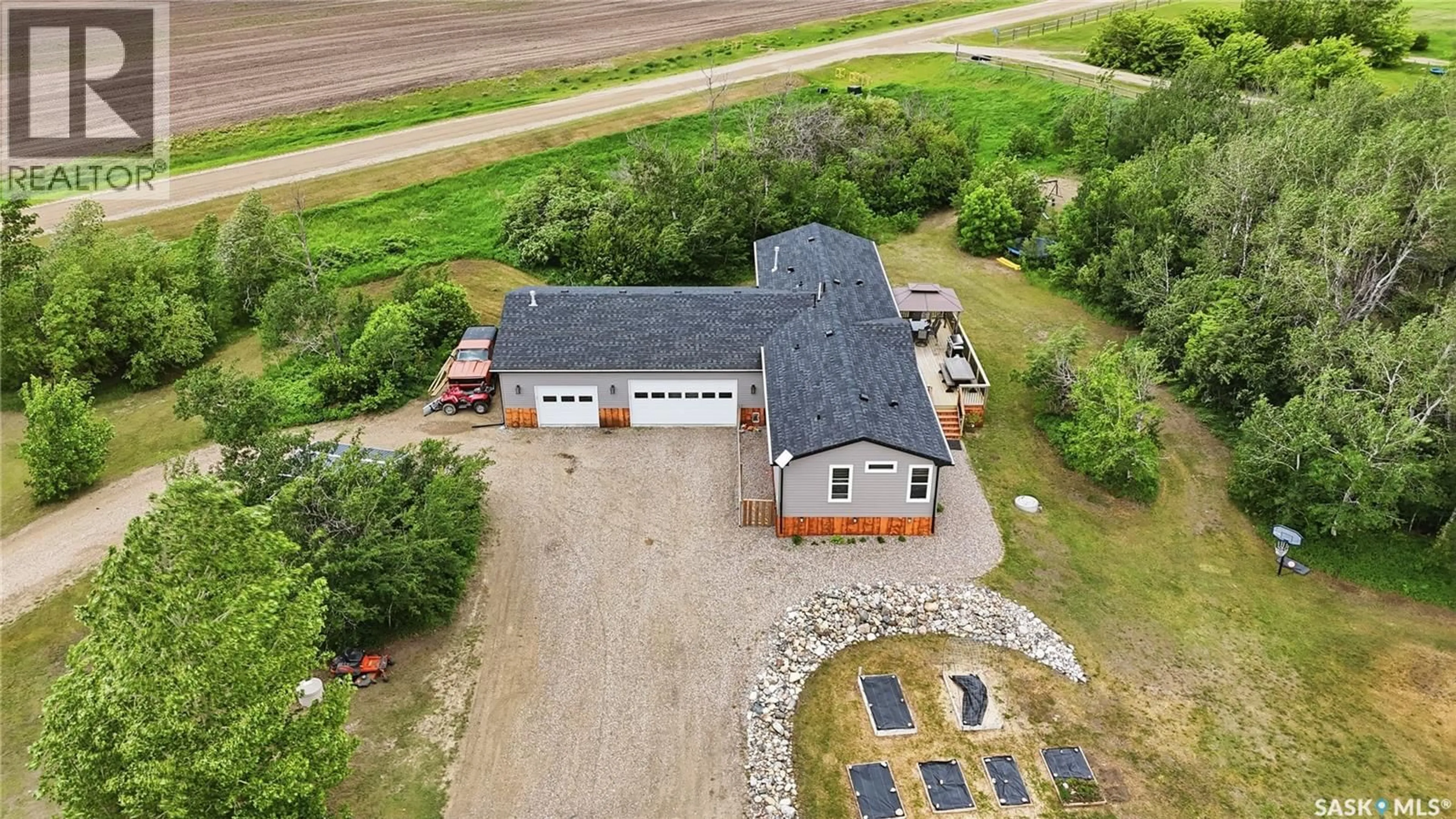 A pic from outside/outdoor area/front of a property/back of a property/a pic from drone, building for 295 WALL ROAD, Rosthern Rm No. 403 Saskatchewan S0K1X1
