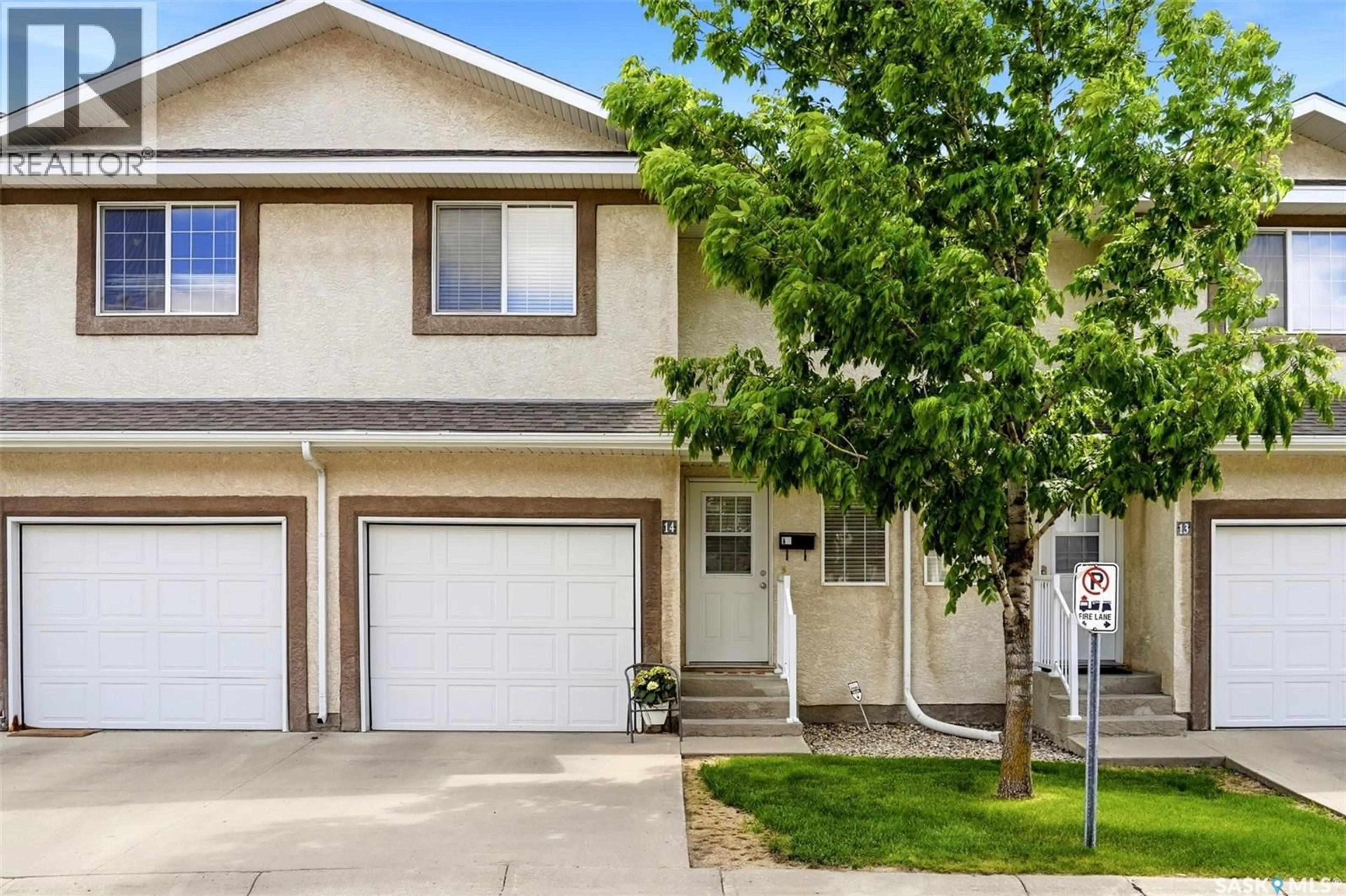 Home with vinyl exterior material, street for 14 2751 WINDSOR PARK ROAD, Regina Saskatchewan S4V1B1