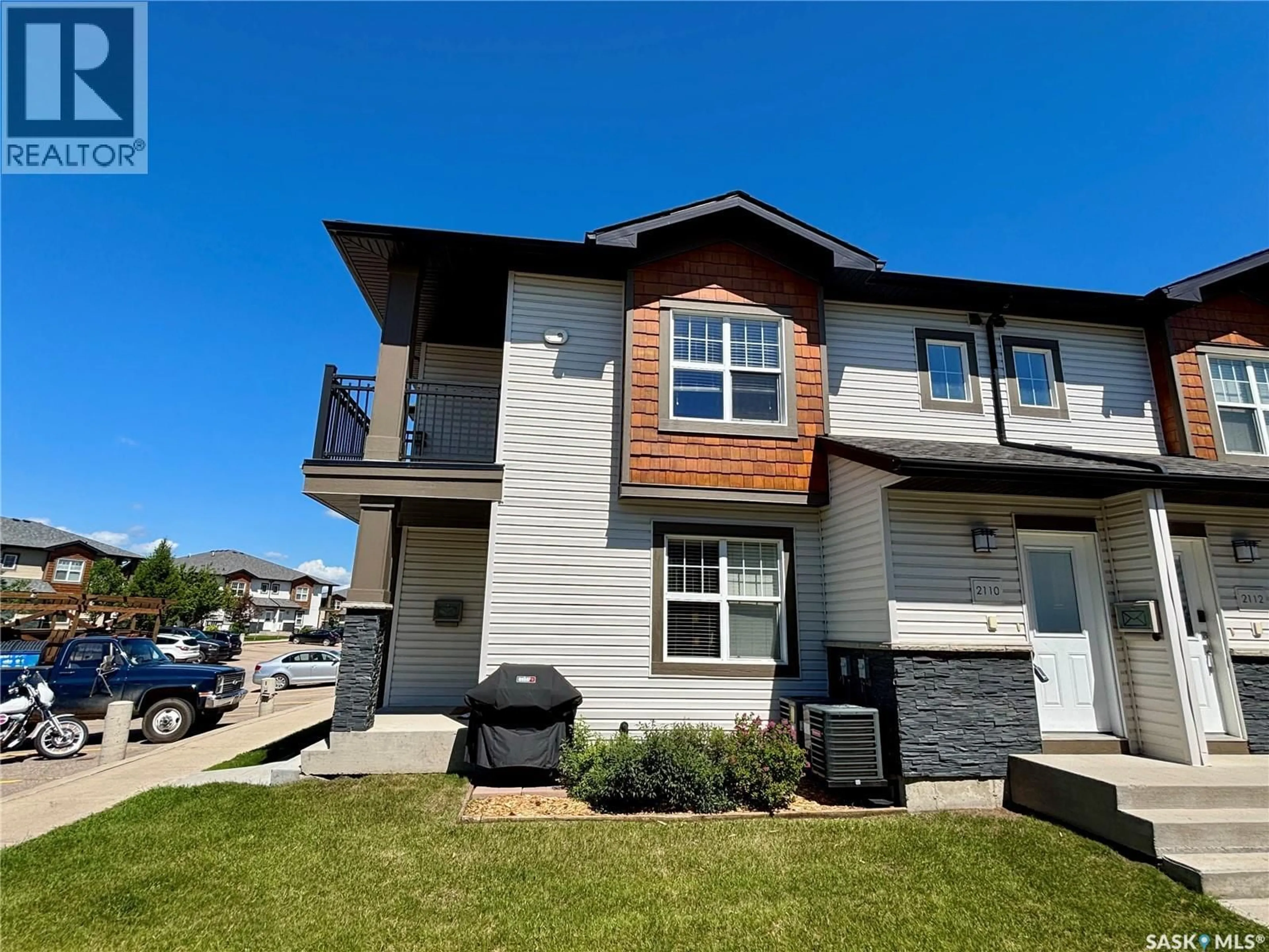 Home with vinyl exterior material, street for 1015 - 2110 PATRICK CRESCENT, Saskatoon Saskatchewan S7W0M2