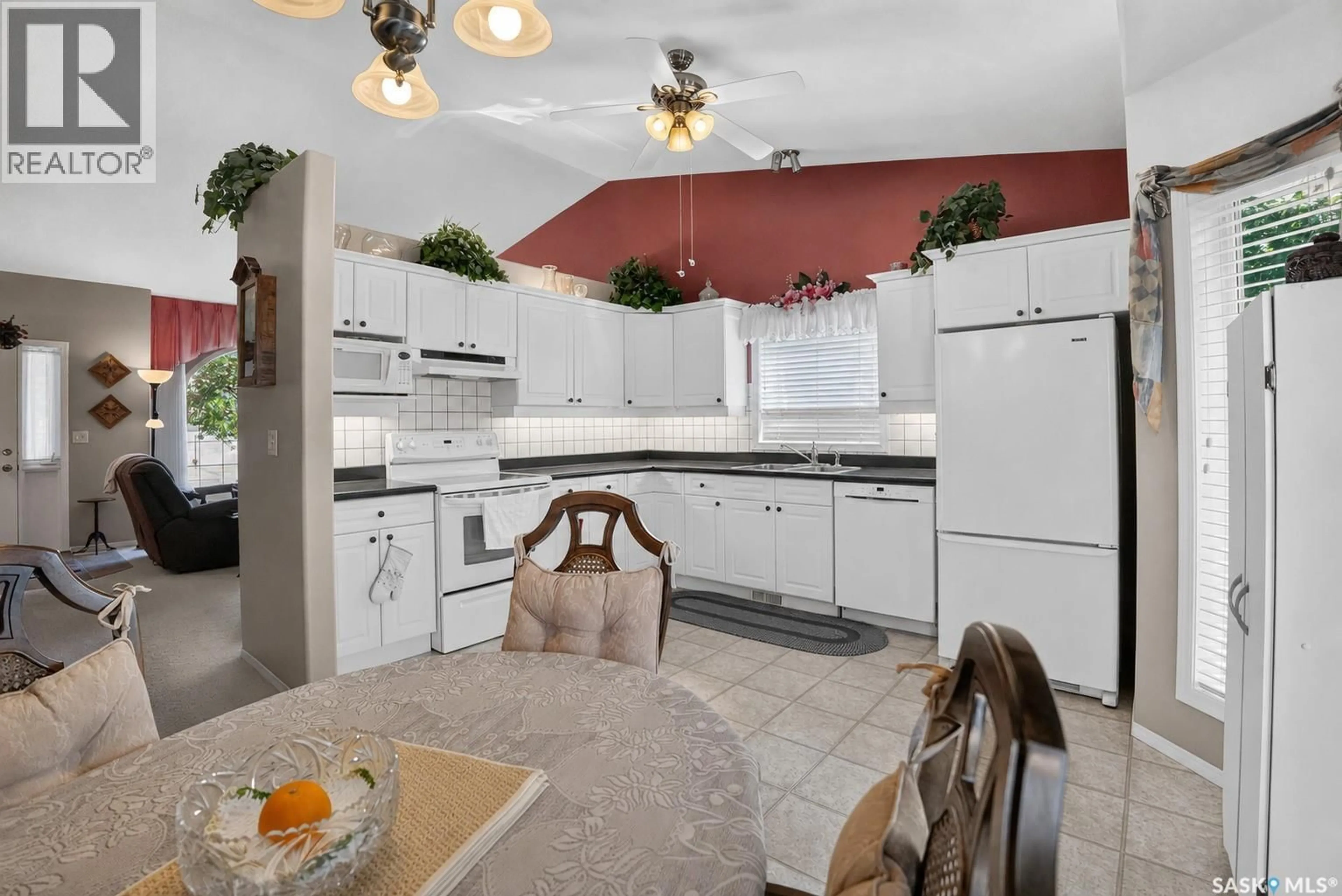 Open concept kitchen, ceramic/tile floor for 307 SUMNER LANE, Saskatoon Saskatchewan S7L7L7