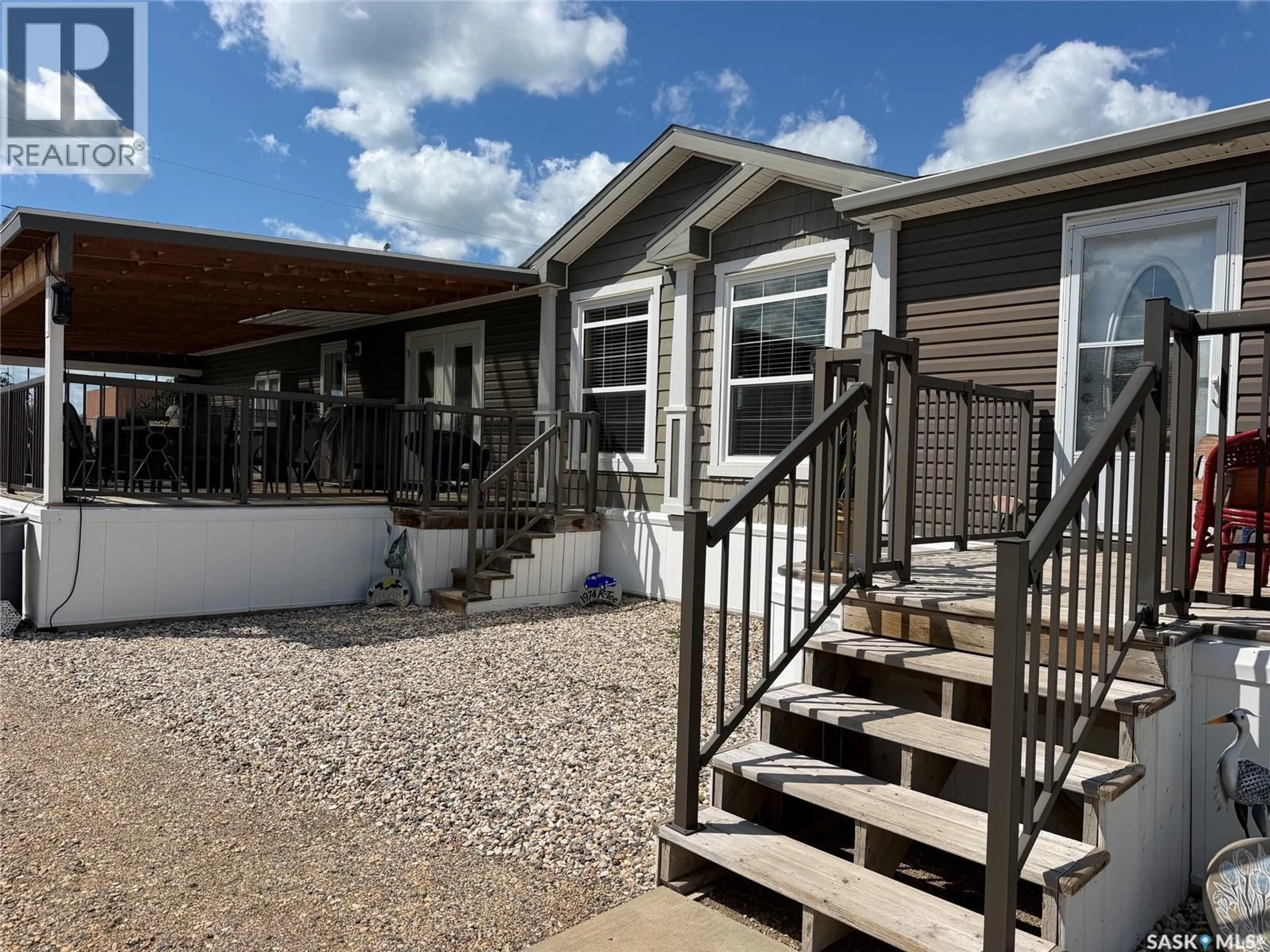 Home with vinyl exterior material, street for 115 PATRICIA STREET, Hudson Bay Saskatchewan S0E0Y0