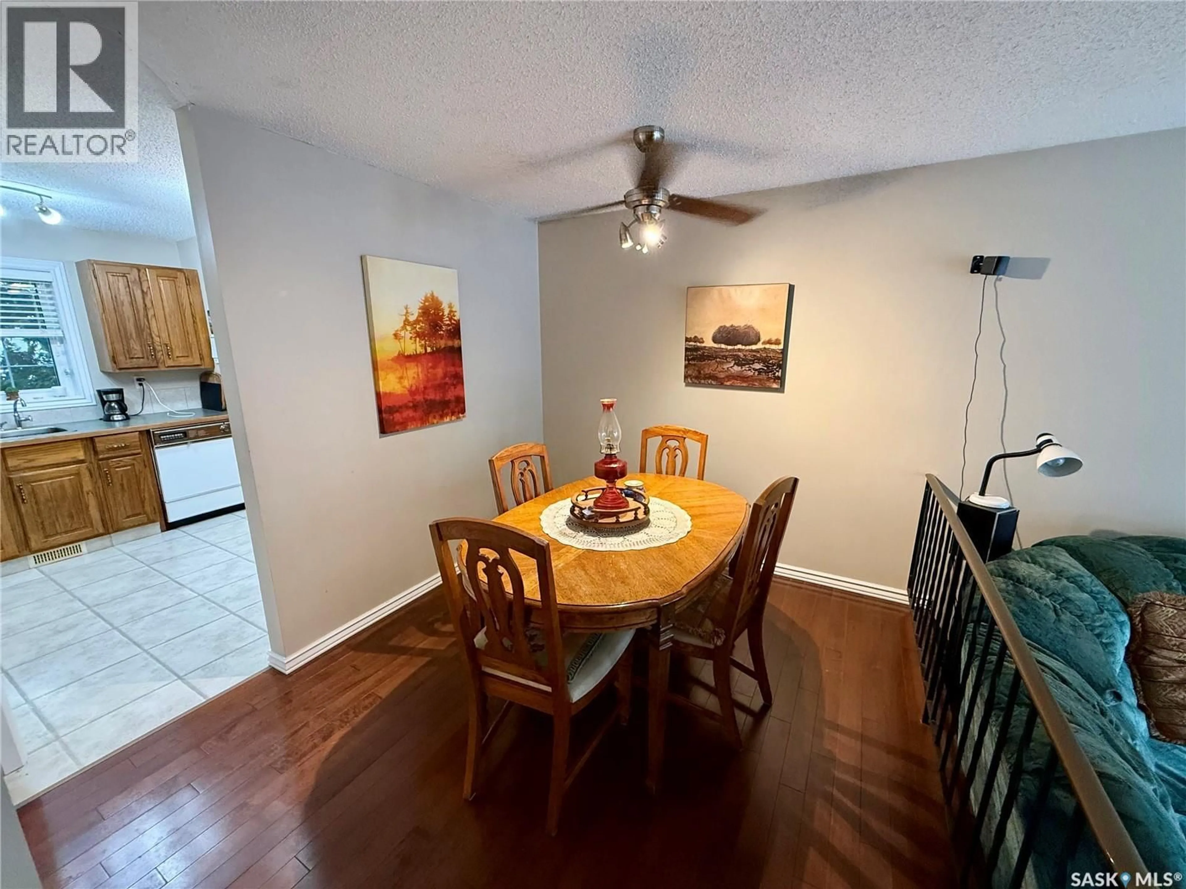 Dining room, wood/laminate floor for 831 SEYMOUR CRESCENT, Regina Saskatchewan S4X2B6