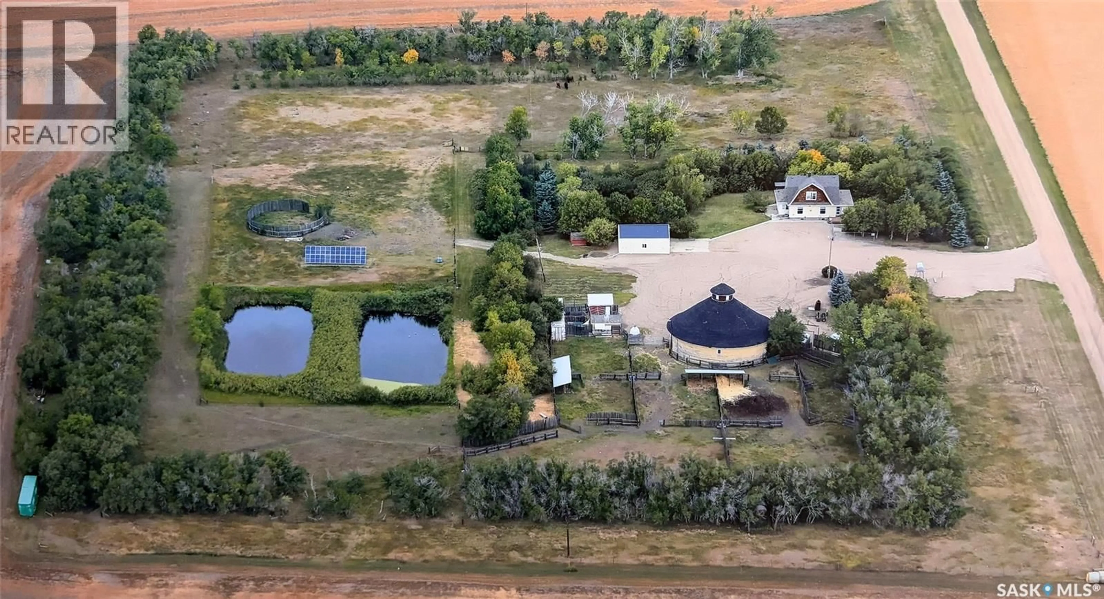 A pic from outside/outdoor area/front of a property/back of a property/a pic from drone, water/lake/river/ocean view for 21 14 22-W2, Rouleau Saskatchewan S0G4H0