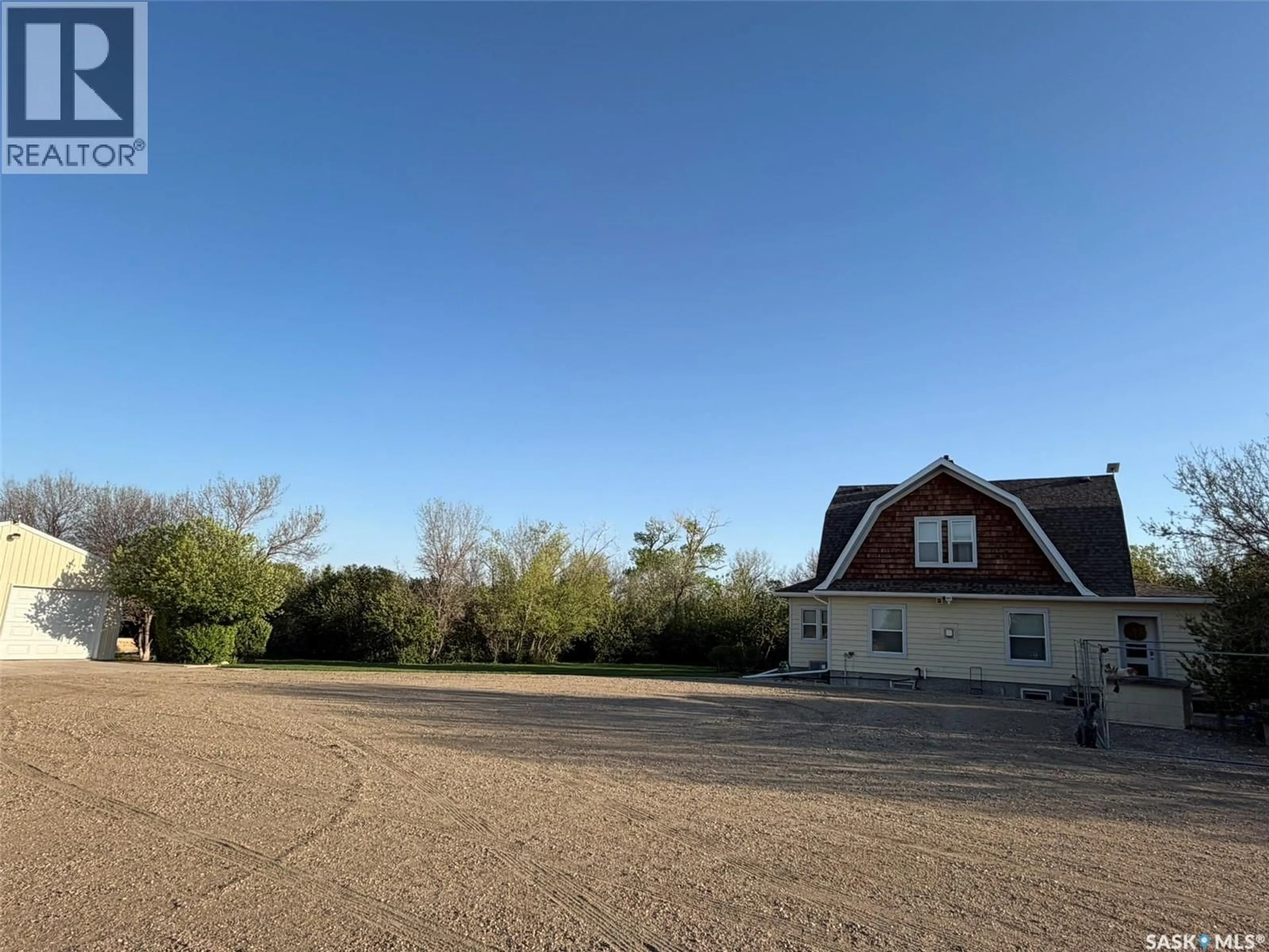 A pic from outside/outdoor area/front of a property/back of a property/a pic from drone, unknown for 21 14 22-W2, Rouleau Saskatchewan S0G4H0