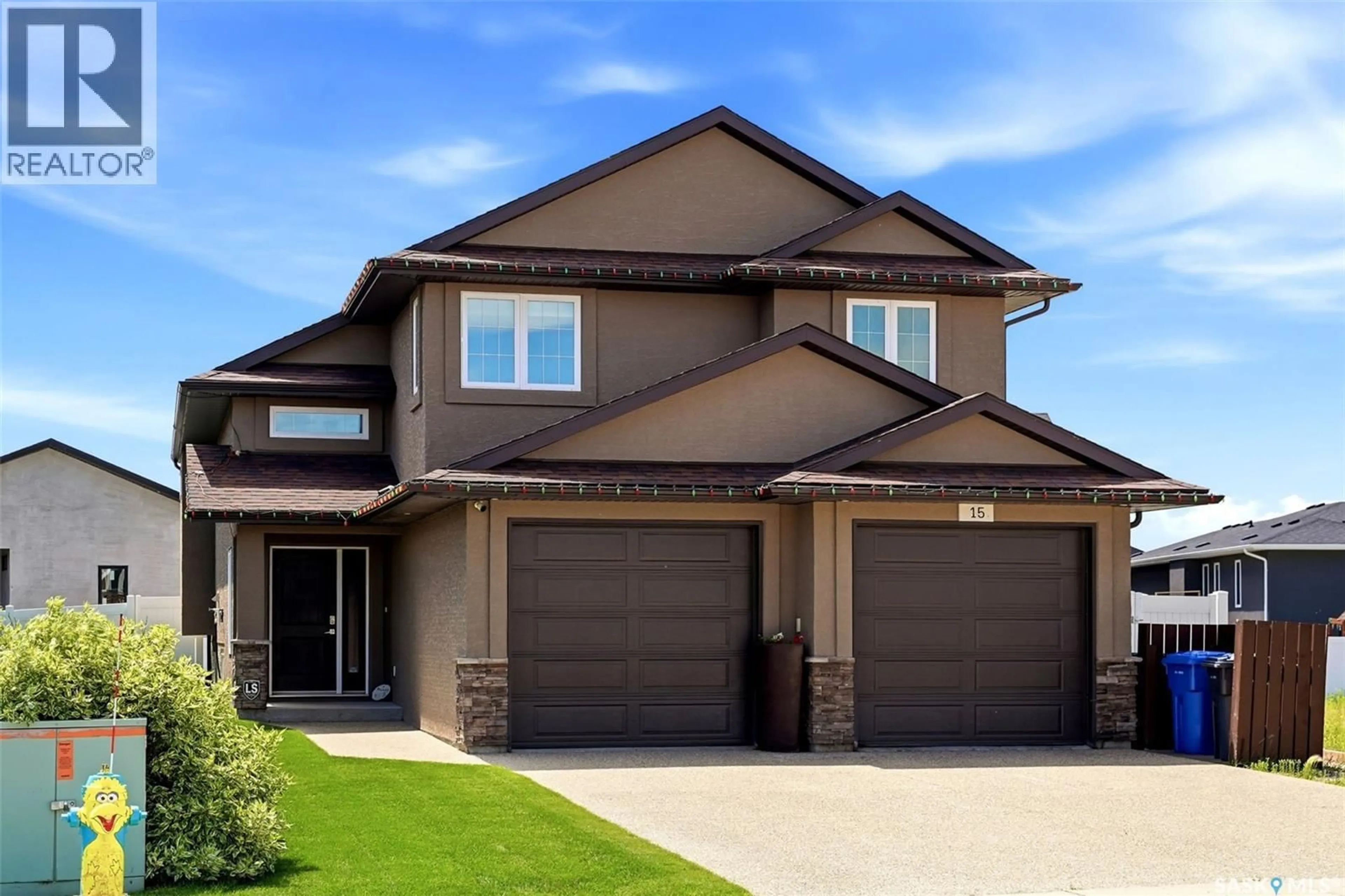 Home with brick exterior material, street for 15 HUDSON DRIVE, Pilot Butte Saskatchewan S0G3Z0