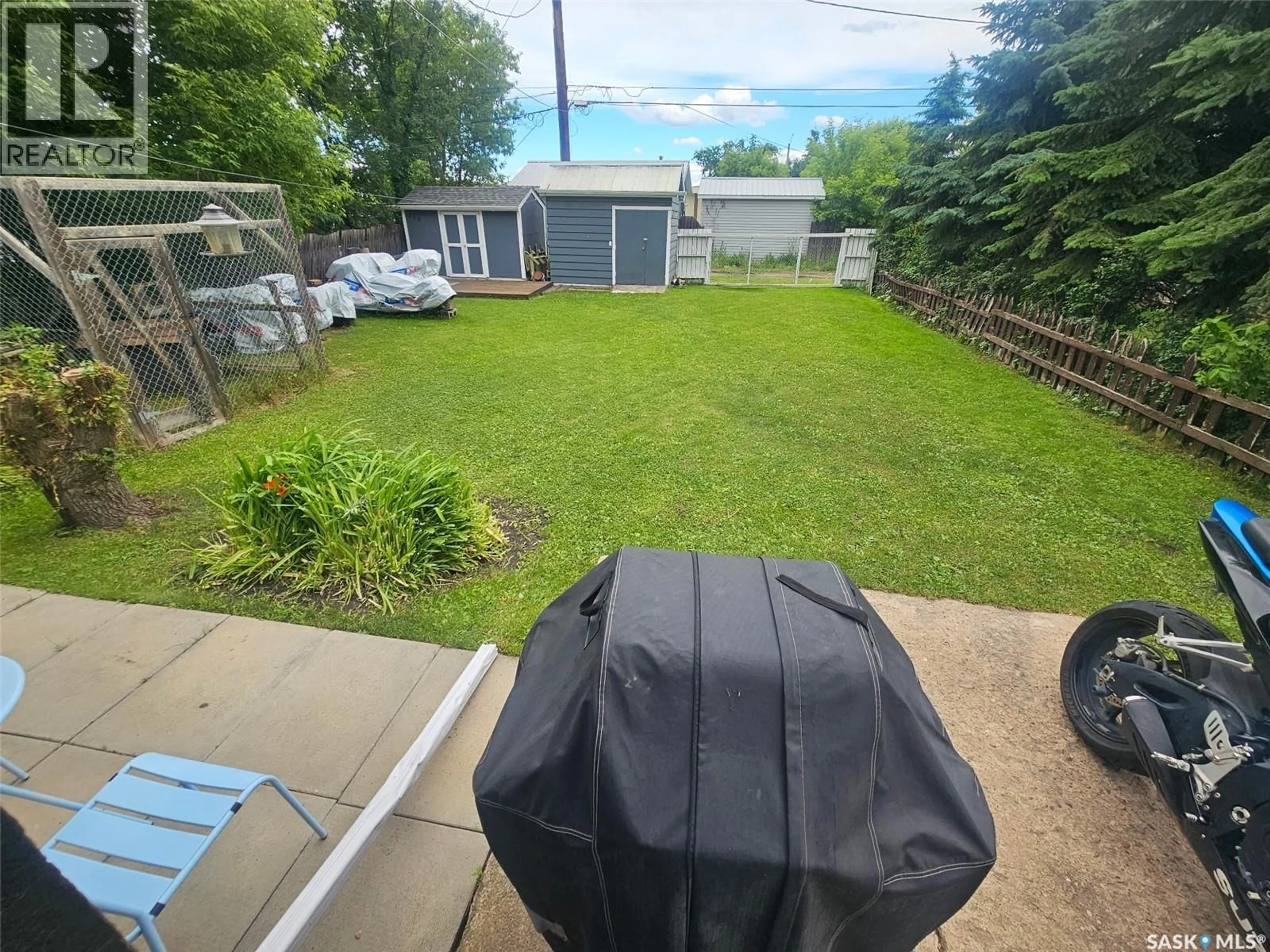 A pic from outside/outdoor area/front of a property/back of a property/a pic from drone, water/lake/river/ocean view for 104 4TH STREET, Meadow Lake Saskatchewan S9X1H4