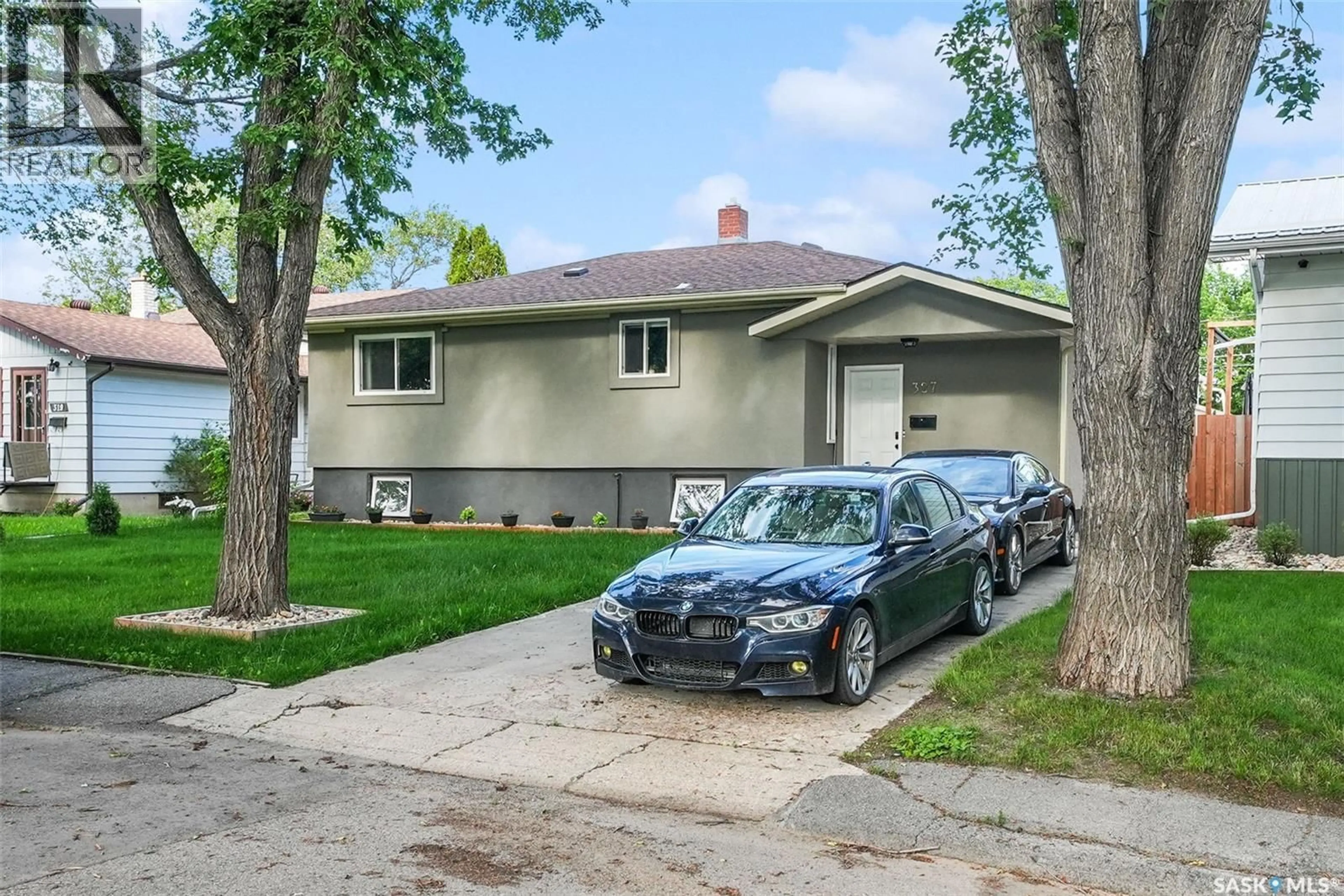 Home with vinyl exterior material, street for 327 RETALLACK STREET, Regina Saskatchewan S4R3N1