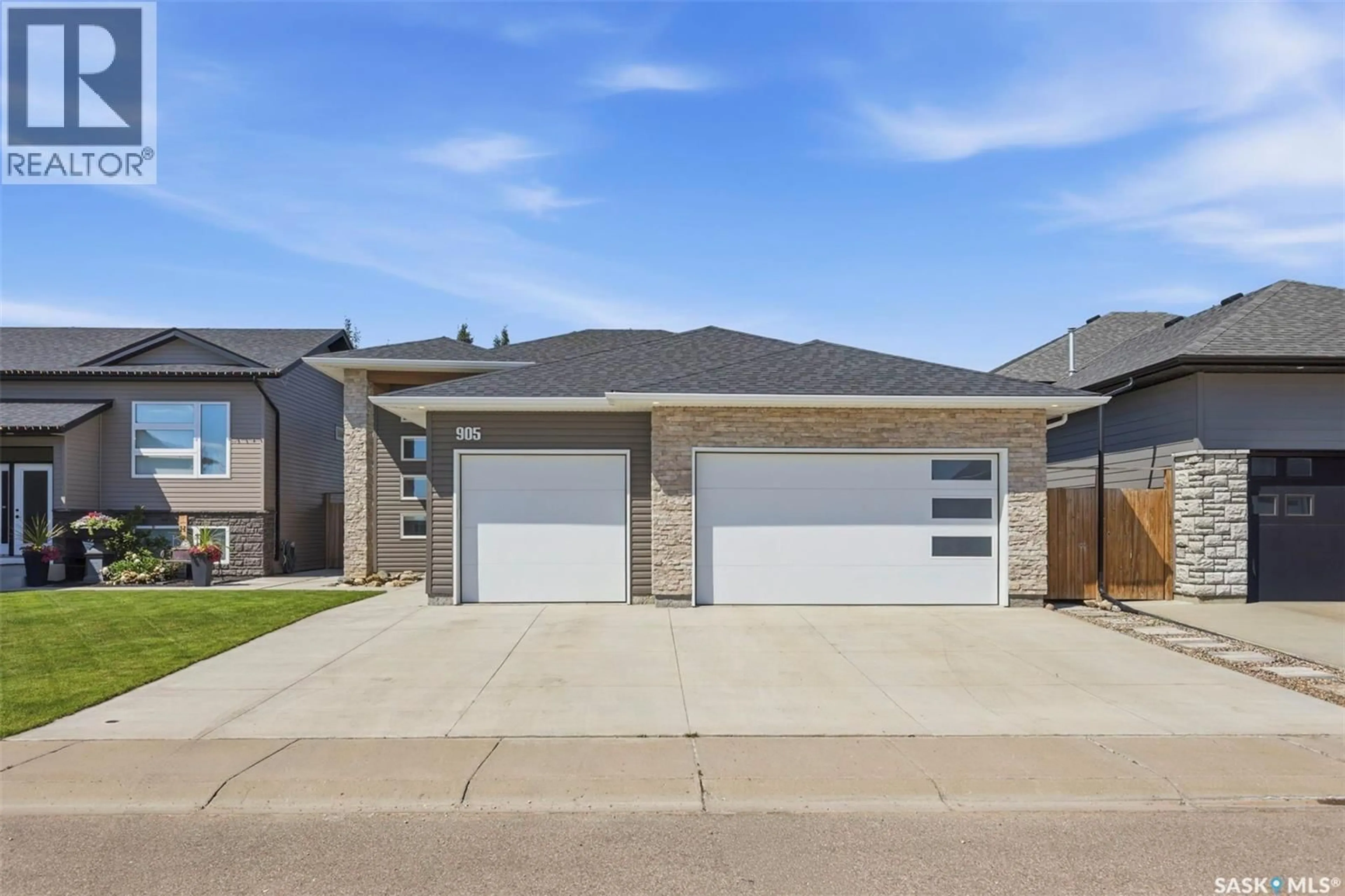 Home with brick exterior material, street for 905 SALMON WAY, Martensville Saskatchewan S0K2T1
