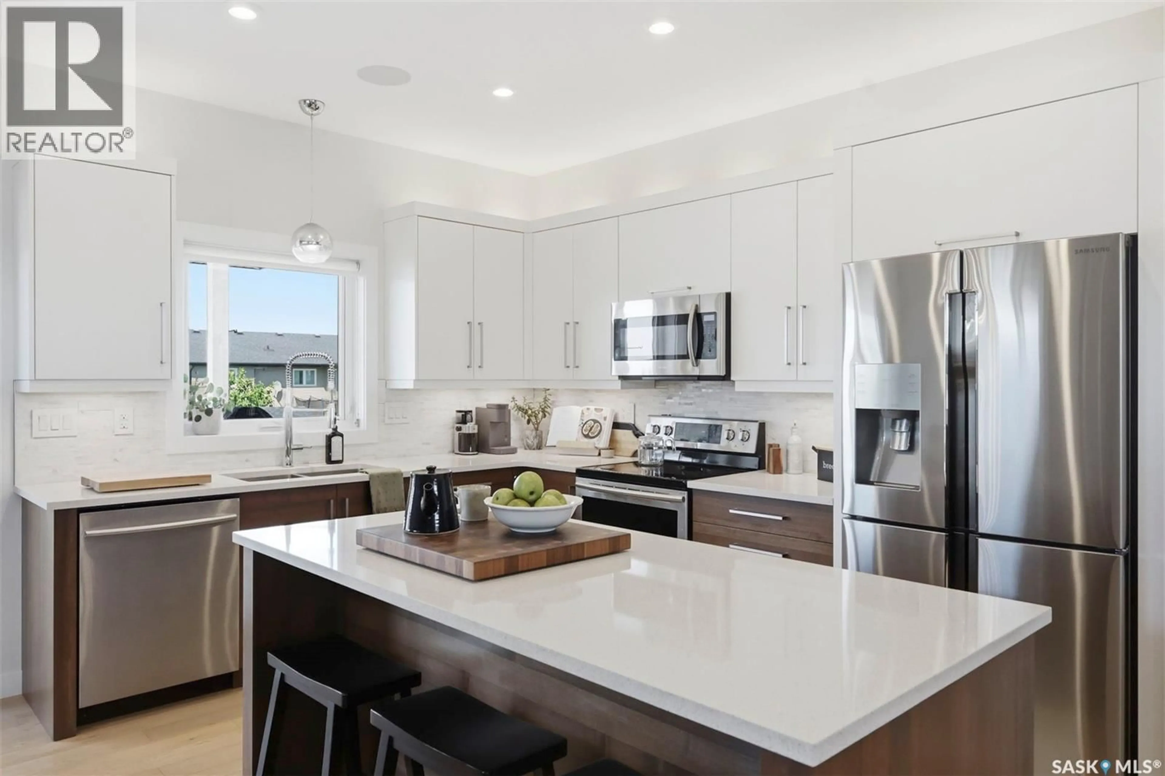 Open concept kitchen, ceramic/tile floor for 905 SALMON WAY, Martensville Saskatchewan S0K2T1