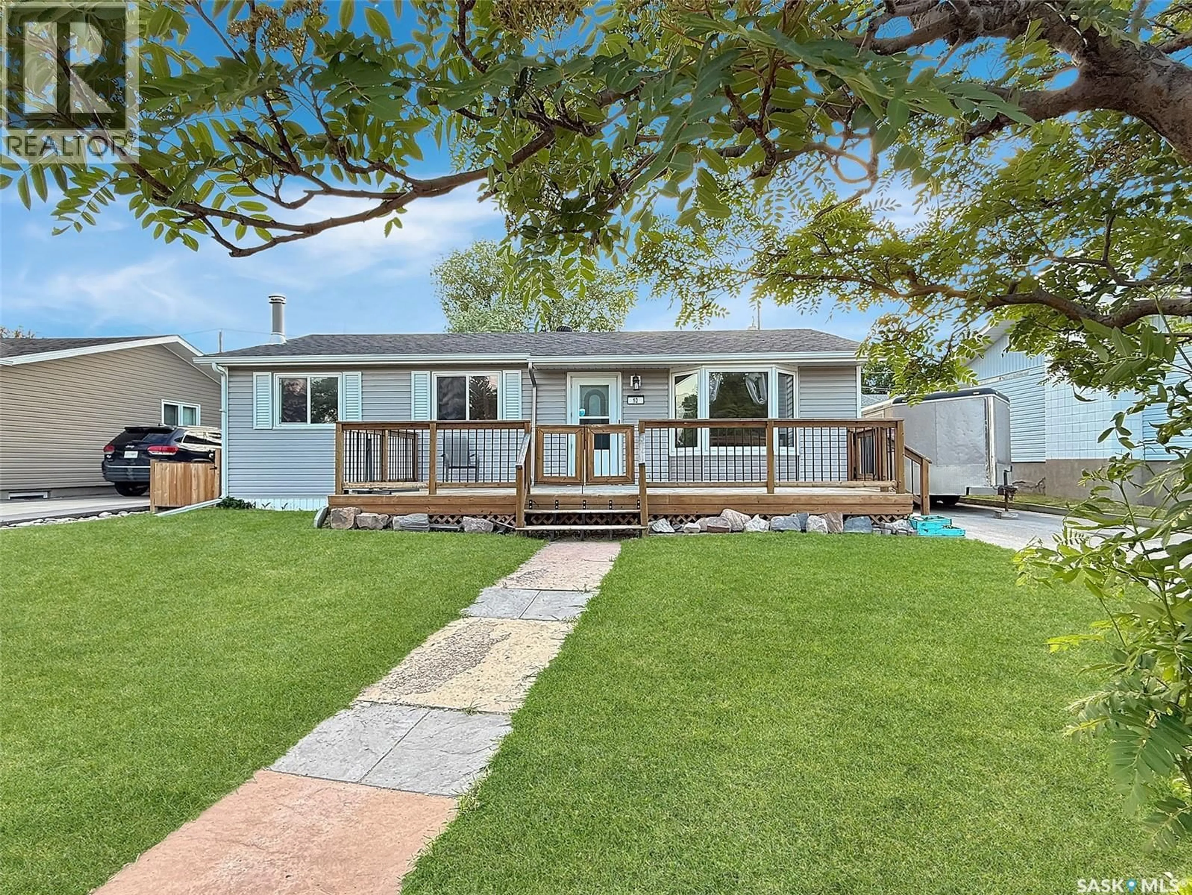 A pic from outside/outdoor area/front of a property/back of a property/a pic from drone, street for 10 MACDONALD CRESCENT, Swift Current Saskatchewan S9H4A7