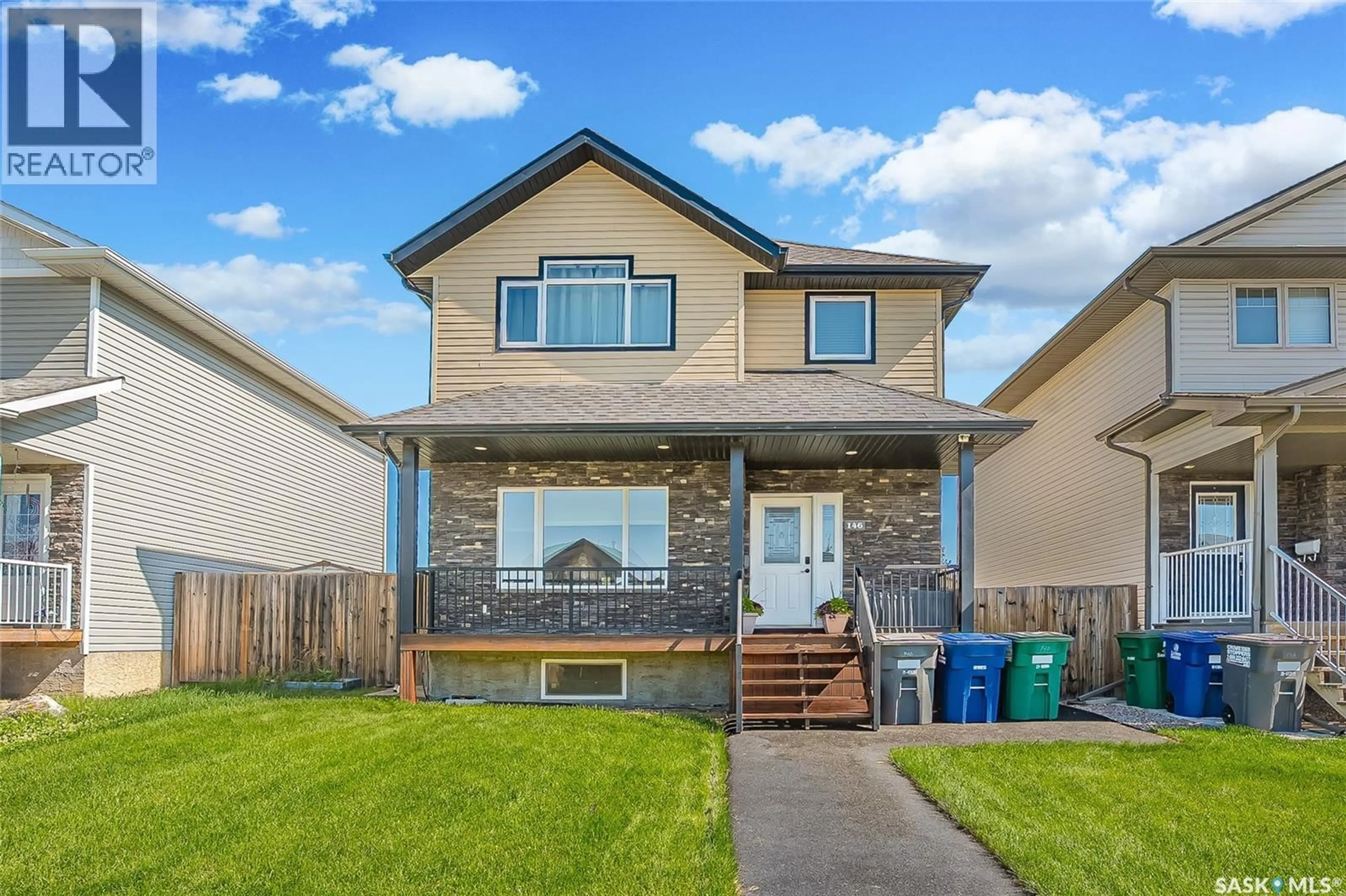 Home with vinyl exterior material, street for 146 WEST HAMPTON BOULEVARD, Saskatoon Saskatchewan S7R0B8