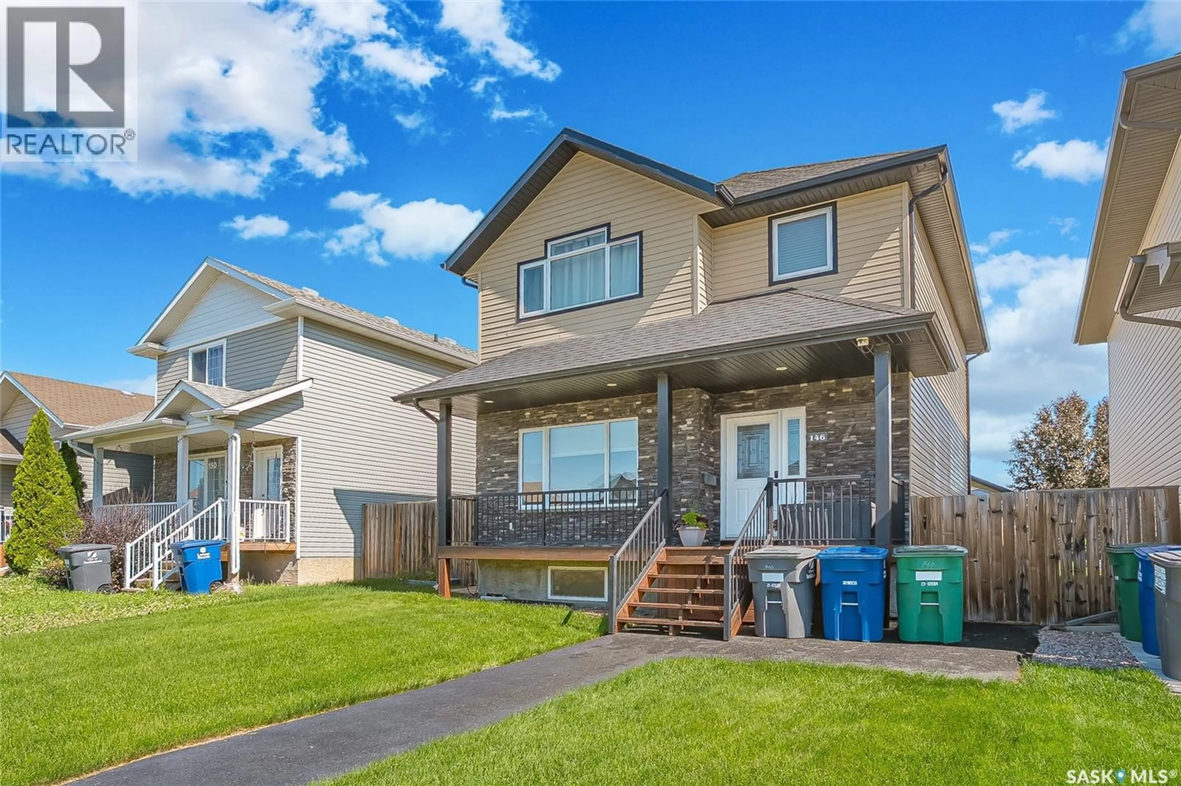 Home with vinyl exterior material, street for 146 WEST HAMPTON BOULEVARD, Saskatoon Saskatchewan S7R0B8