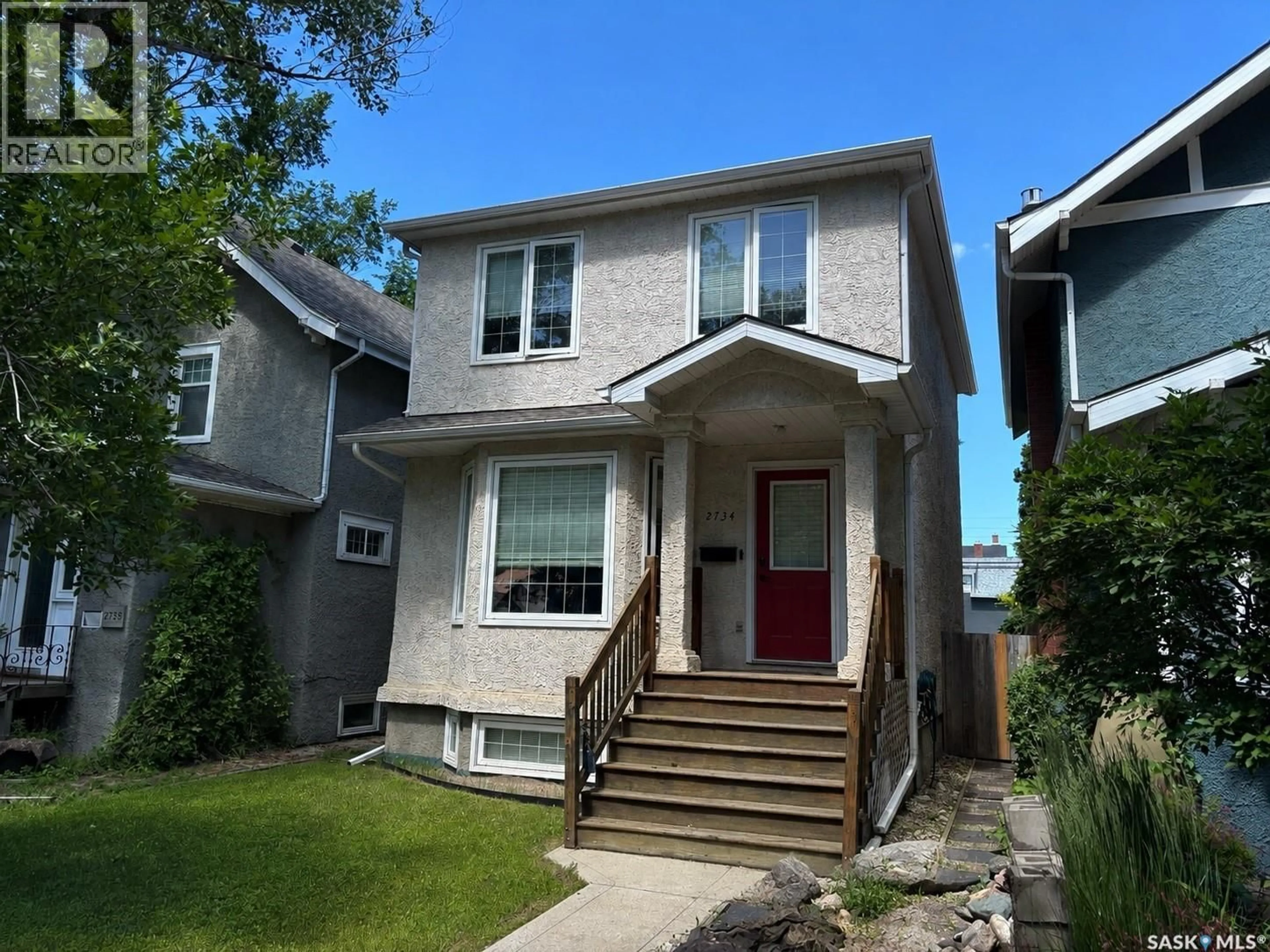 Home with vinyl exterior material, street for 2734 VICTORIA AVENUE, Regina Saskatchewan S4T1K3