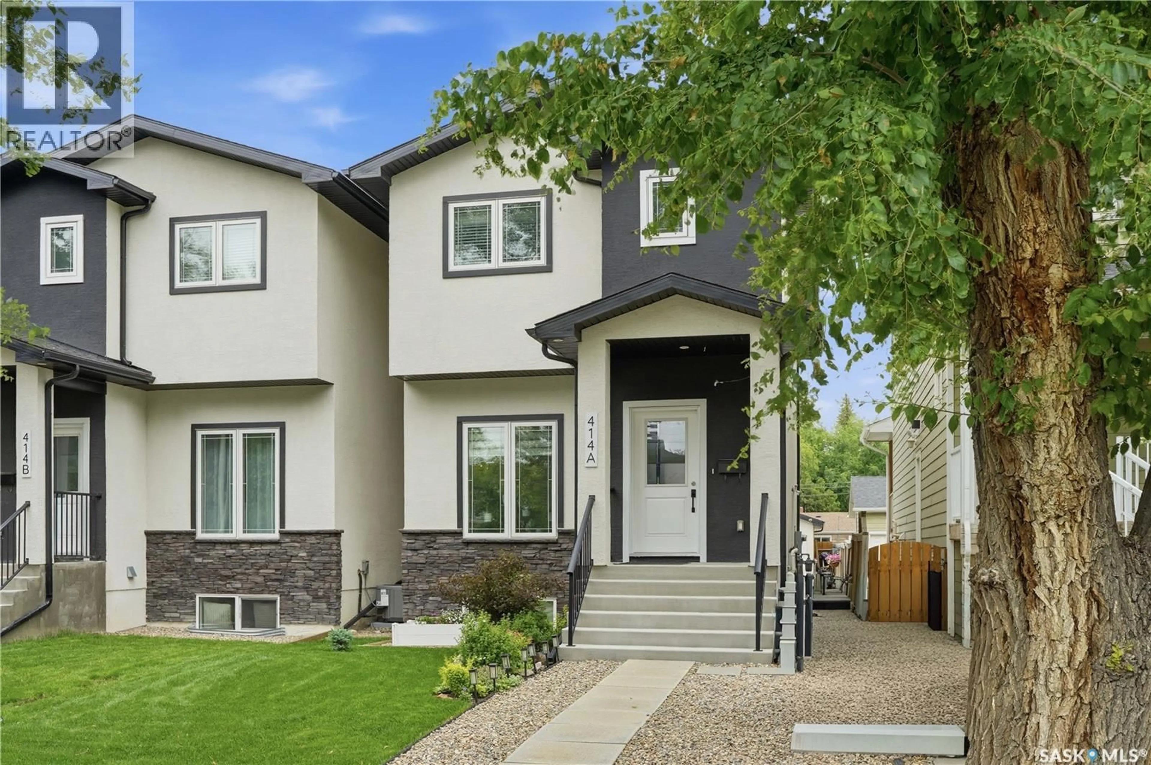 Home with vinyl exterior material, street for 414A 109TH STREET, Saskatoon Saskatchewan S7N1R7