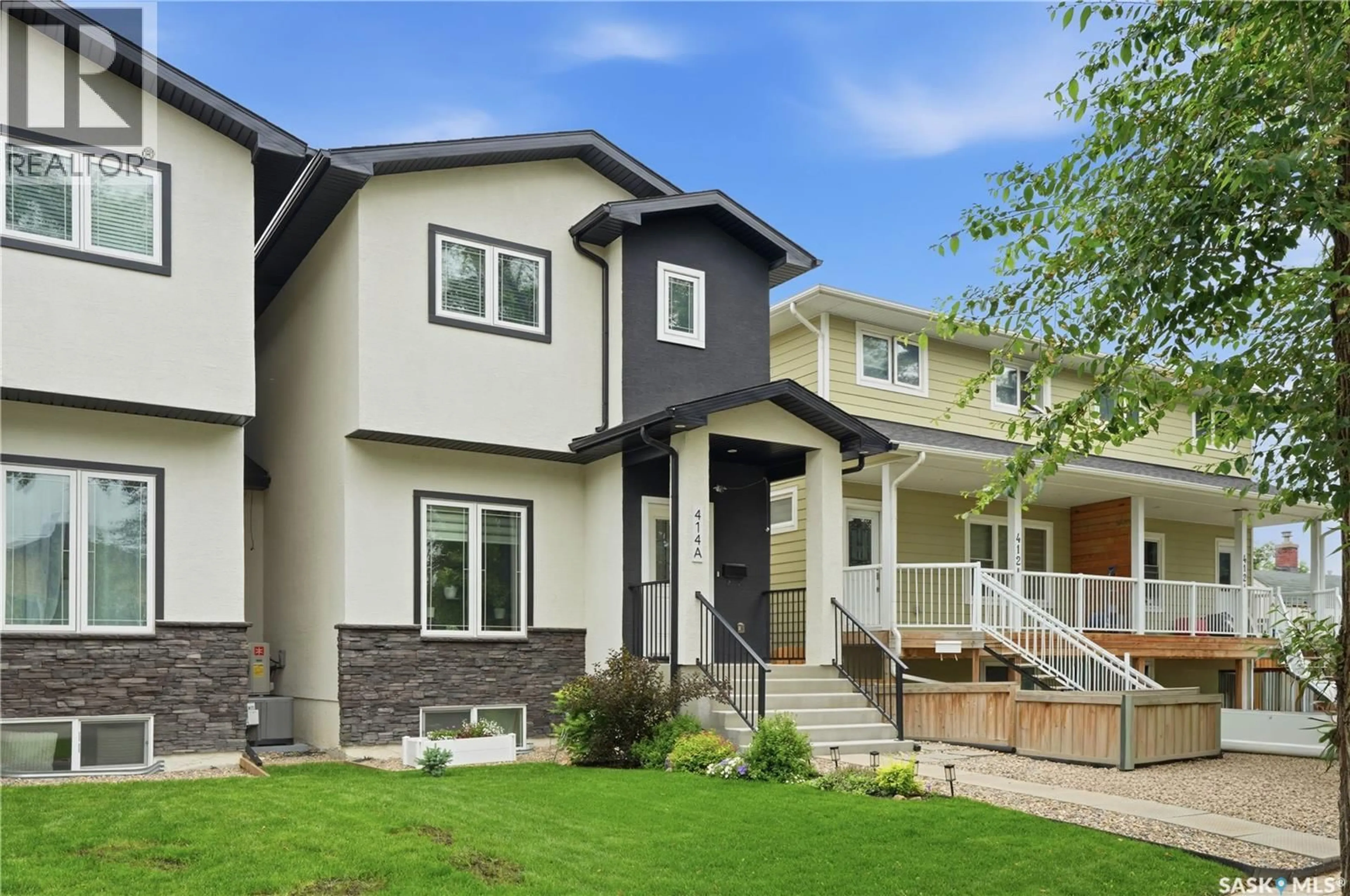 Home with vinyl exterior material, street for 414A 109TH STREET, Saskatoon Saskatchewan S7N1R7