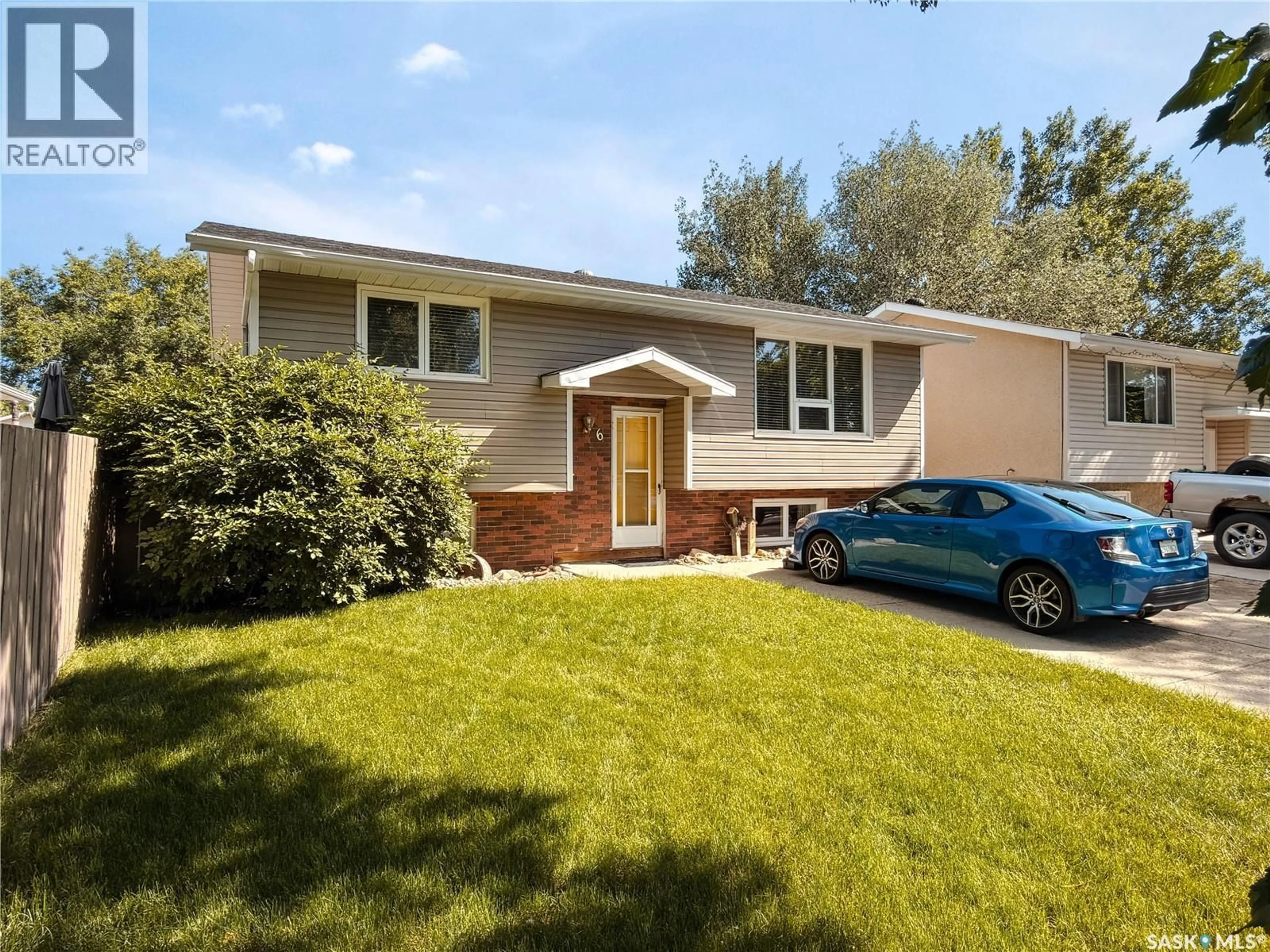 Home with vinyl exterior material, street for 6 FULTON DRIVE, Regina Saskatchewan S4X1E9