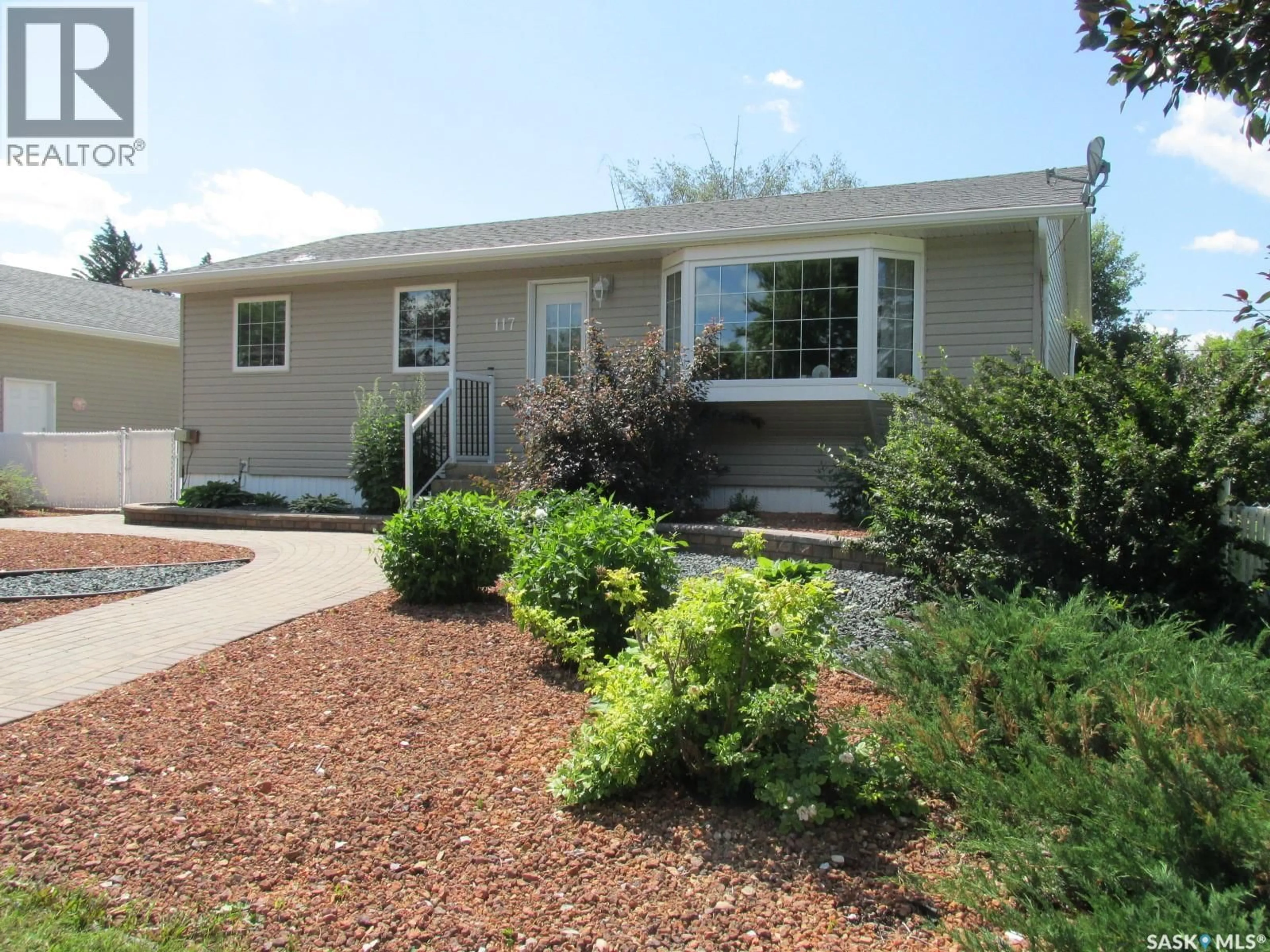 Home with vinyl exterior material, street for 117 3RD STREET, Star City Saskatchewan S0E1P0