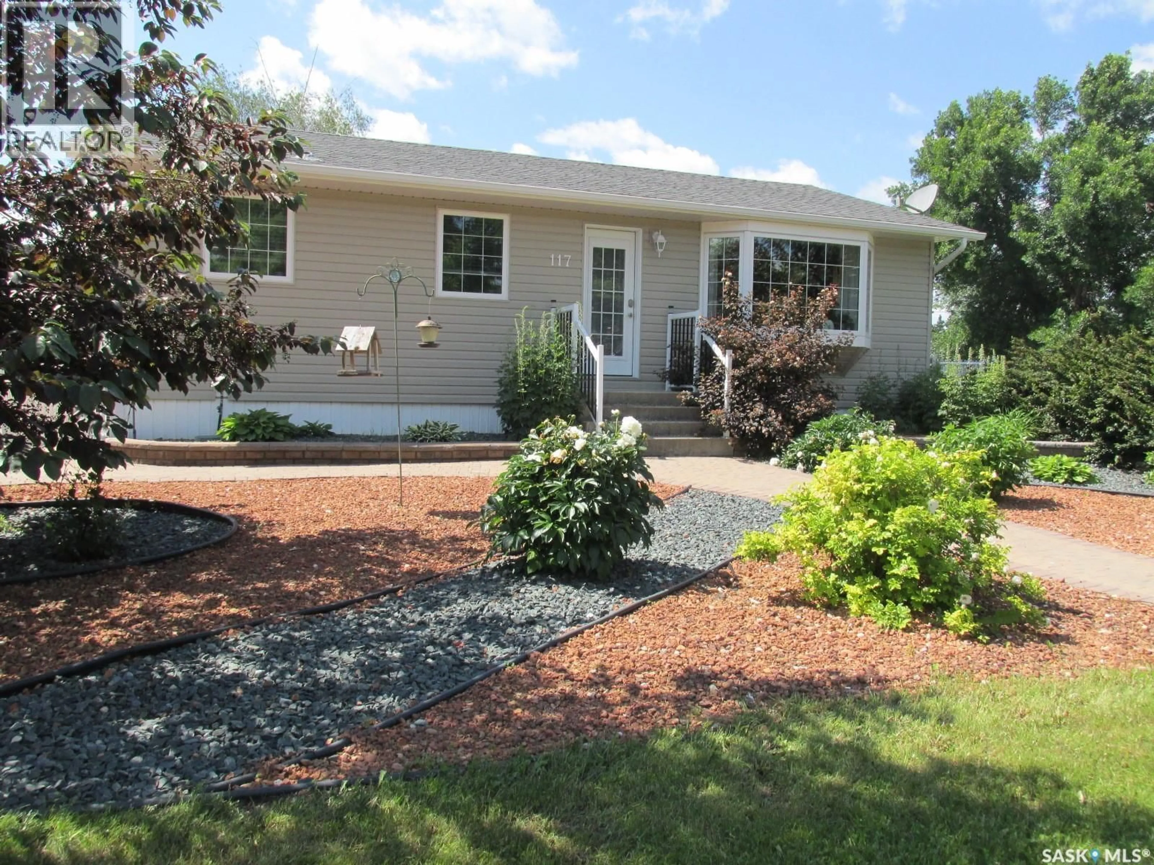 Home with vinyl exterior material, street for 117 3RD STREET, Star City Saskatchewan S0E1P0