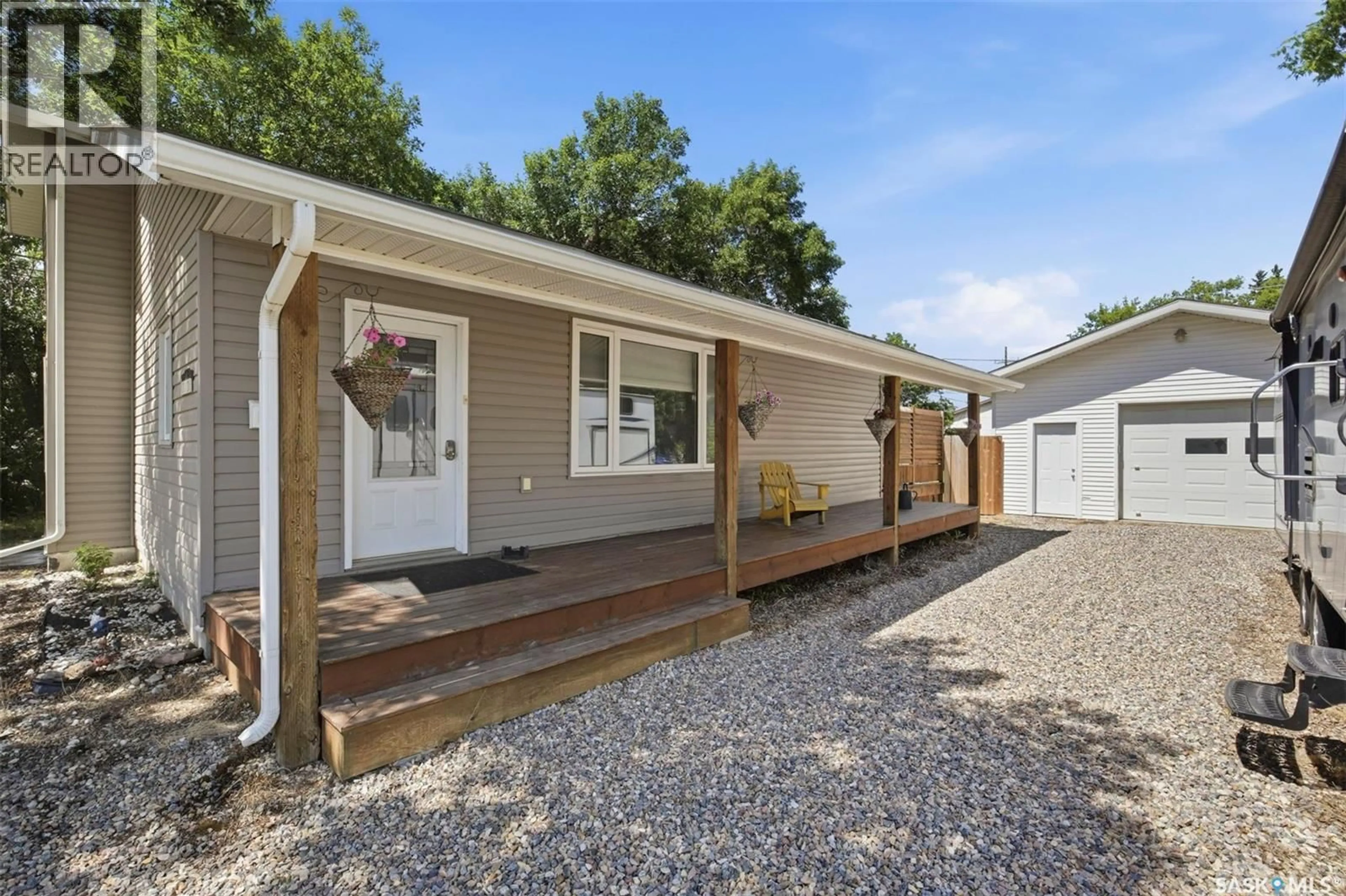 Home with vinyl exterior material, street for 312 3RD STREET, Warman Saskatchewan S0K4S2