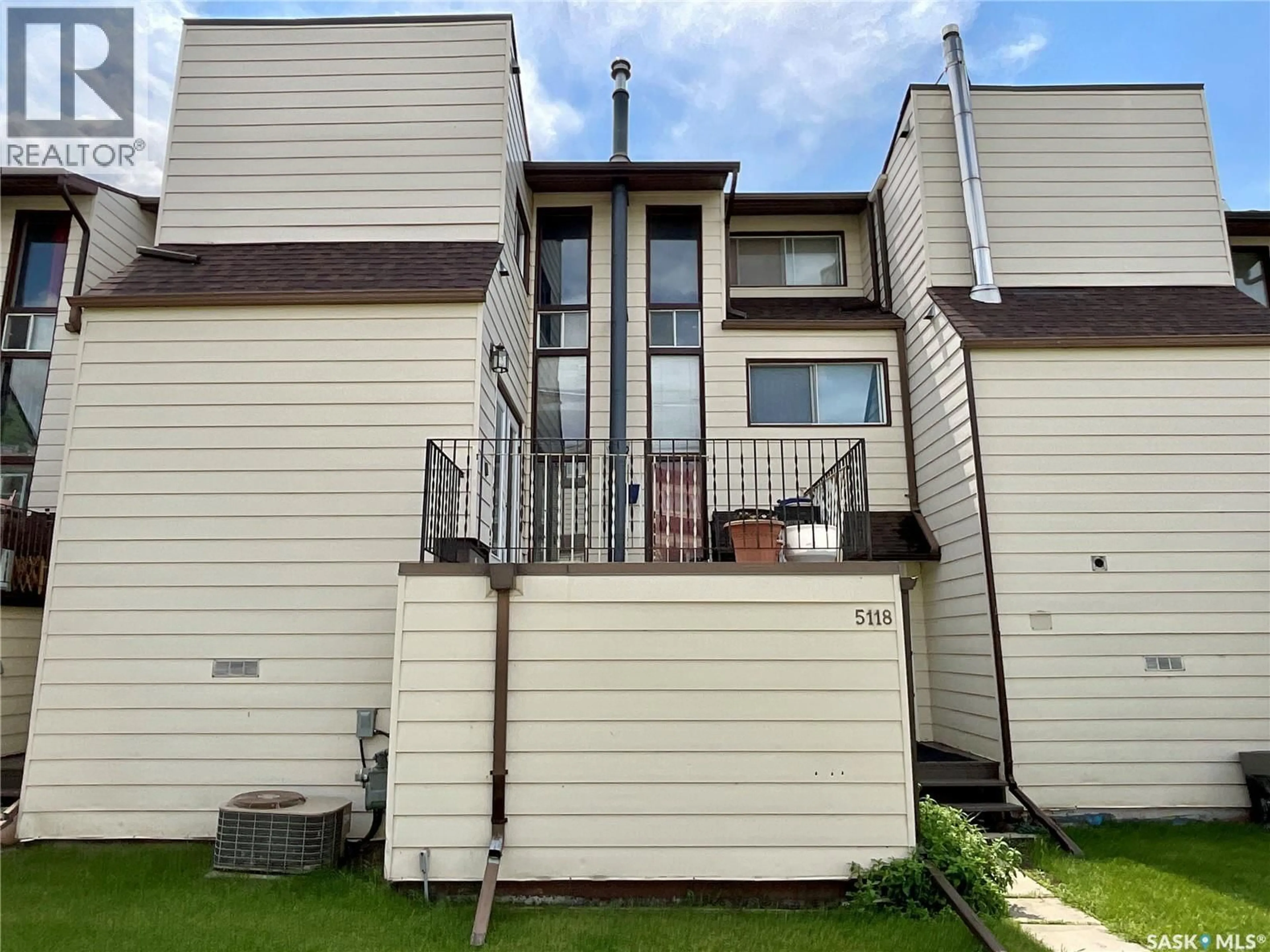Home with vinyl exterior material, street for 5118 10TH AVENUE, Regina Saskatchewan S4T7P5