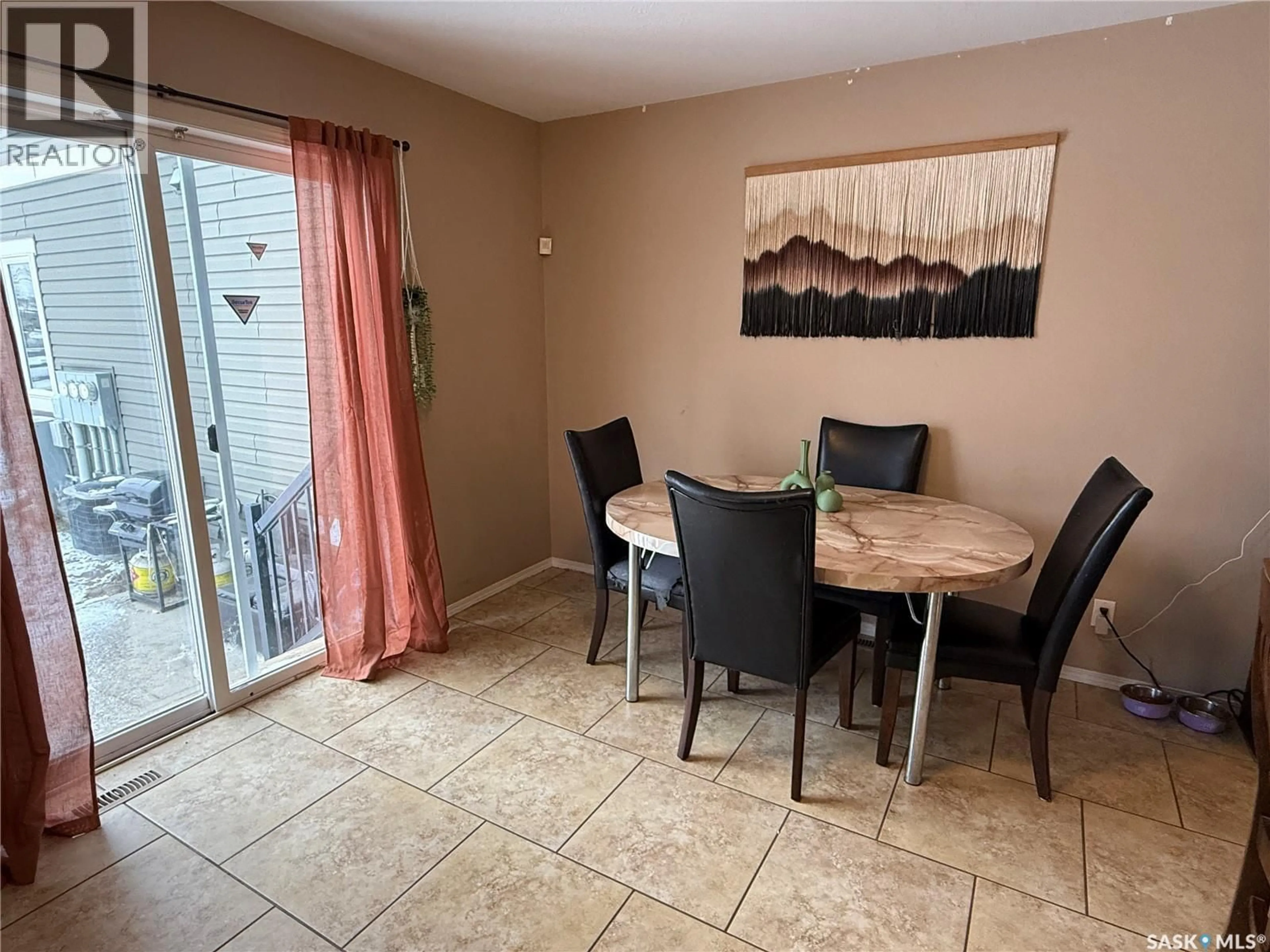 Dining room, ceramic/tile floor for 4 1795 CLARK AVENUE, Weyburn Saskatchewan S4H3L3