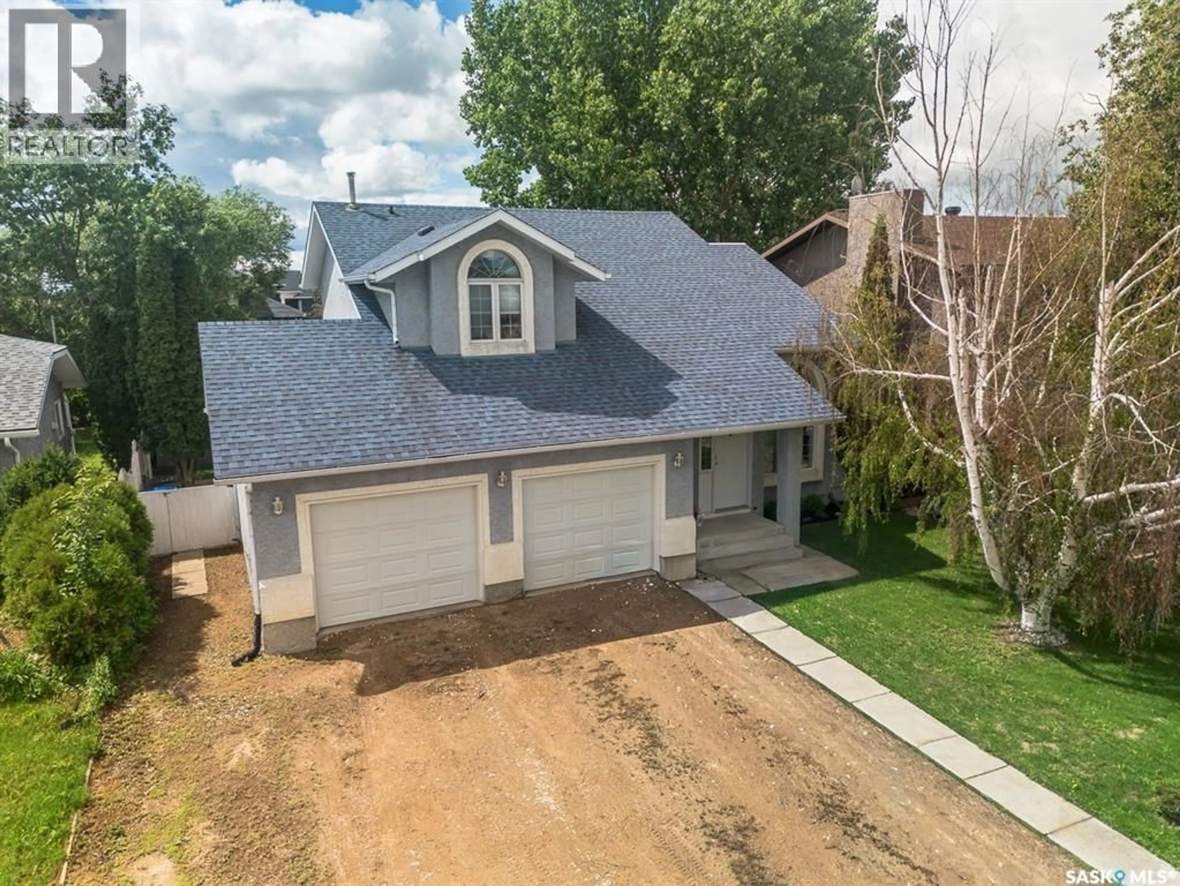 A pic from outside/outdoor area/front of a property/back of a property/a pic from drone, street for 418 FEHR CRESCENT, Martensville Saskatchewan S0K2T0