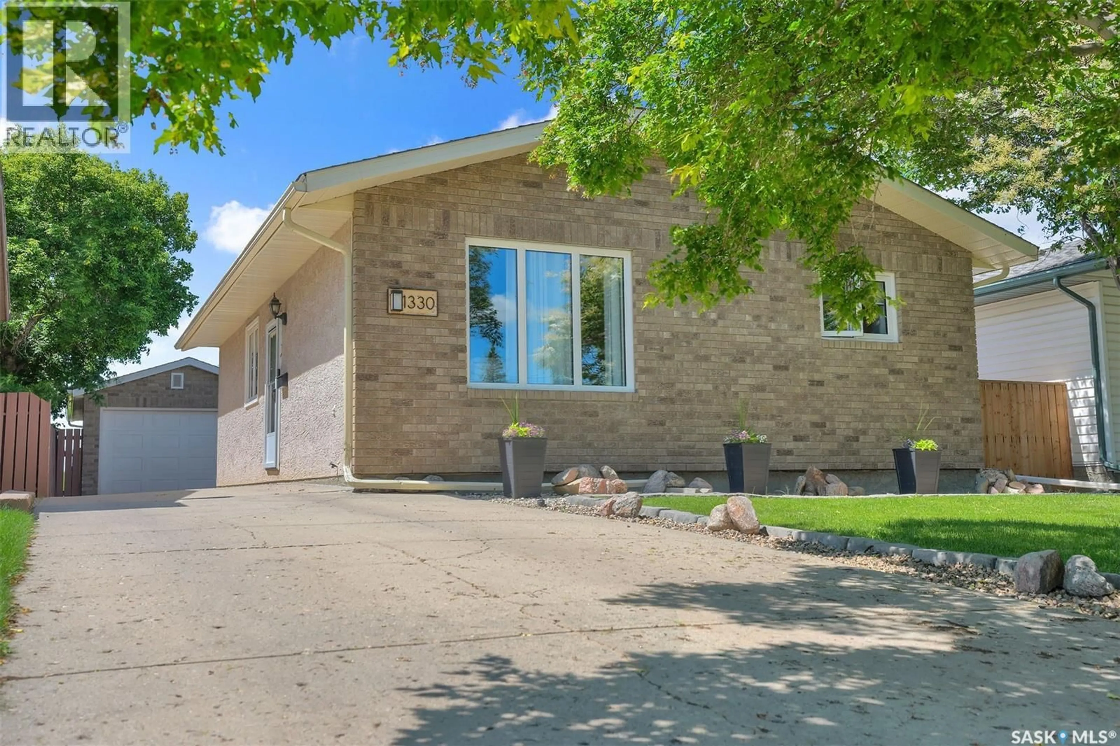 Home with brick exterior material, street for 1330 COURTNEY STREET, Regina Saskatchewan S4T7S1