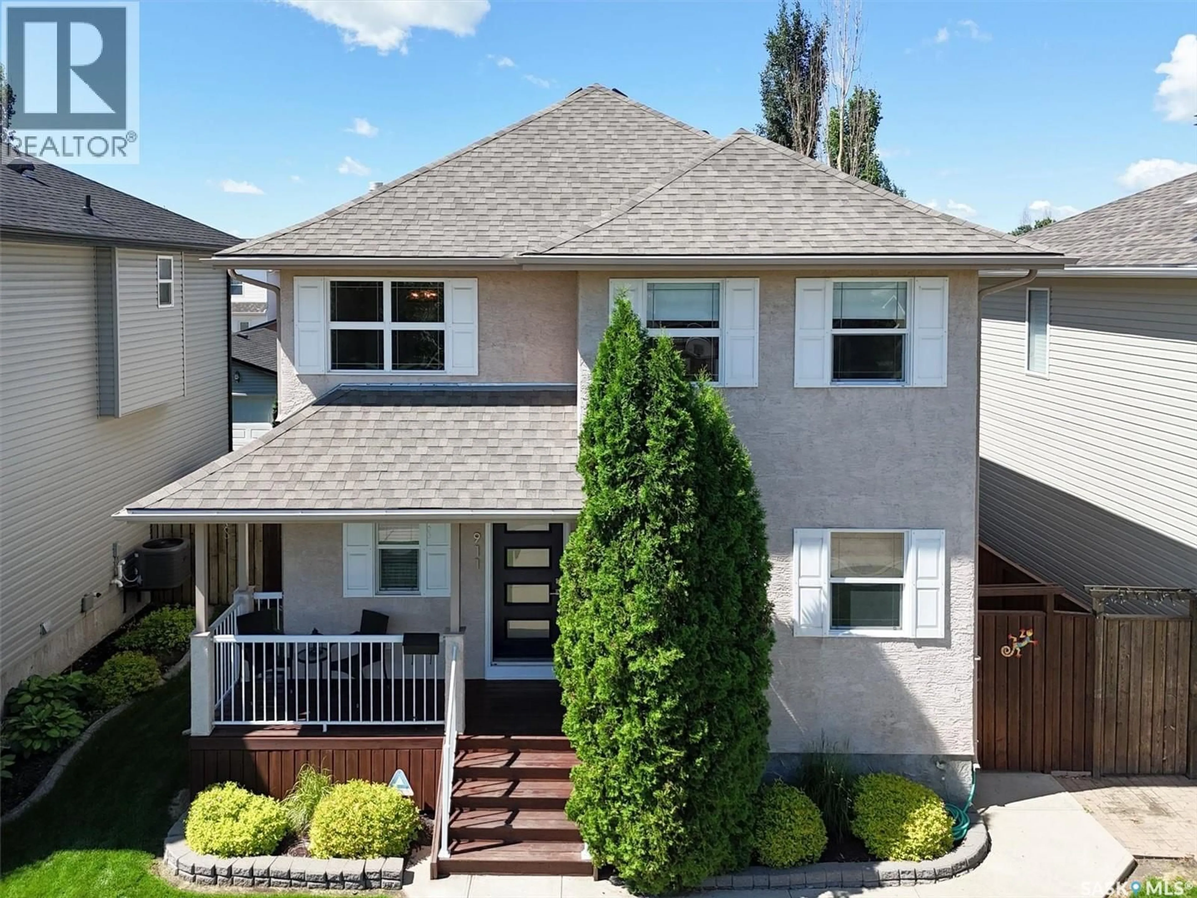 A pic from outside/outdoor area/front of a property/back of a property/a pic from drone, street for 911 MAGUIRE CRESCENT, Saskatoon Saskatchewan S7W1A5