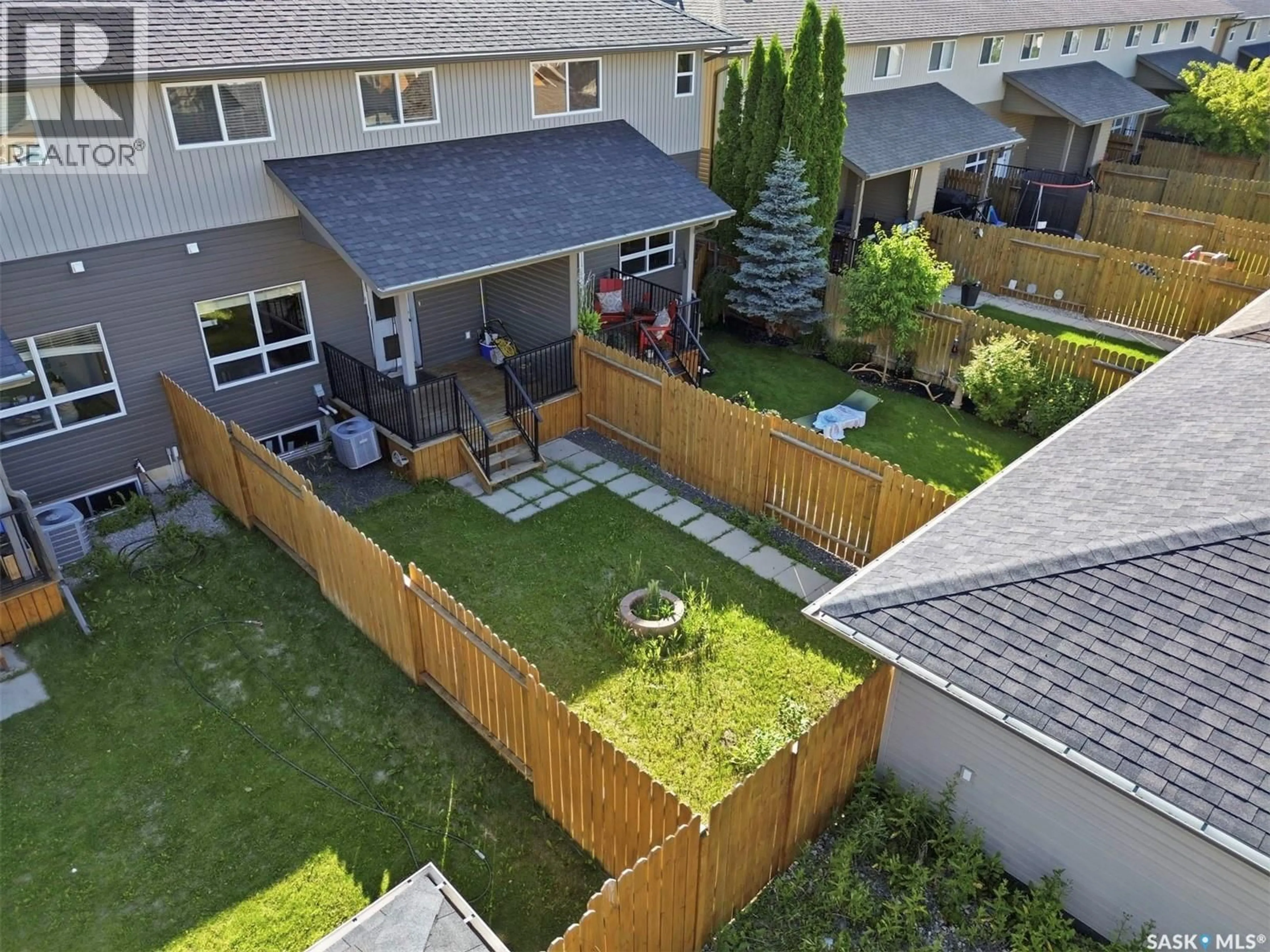 A pic from outside/outdoor area/front of a property/back of a property/a pic from drone, unknown for 320 WILLOWGROVE LANE, Saskatoon Saskatchewan S7W0H7