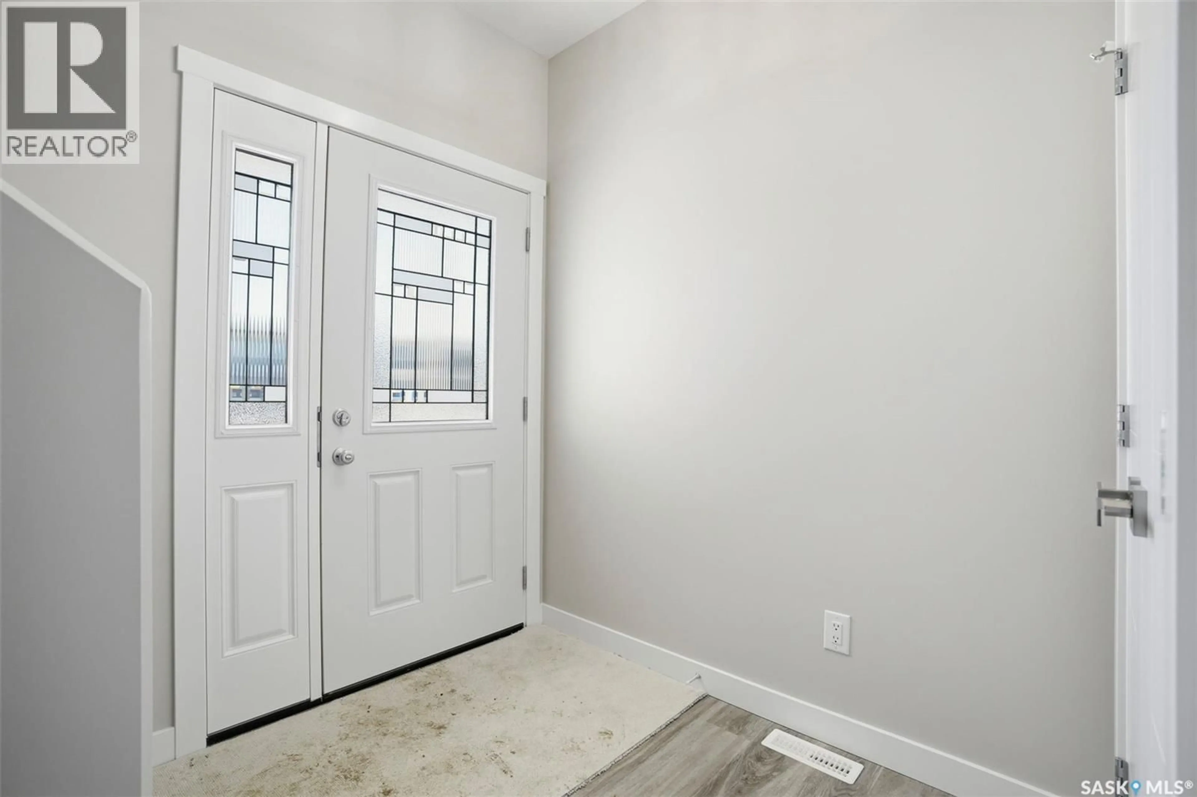 Indoor entryway for 203 SHARMA LANE, Saskatoon Saskatchewan S7W0Y4