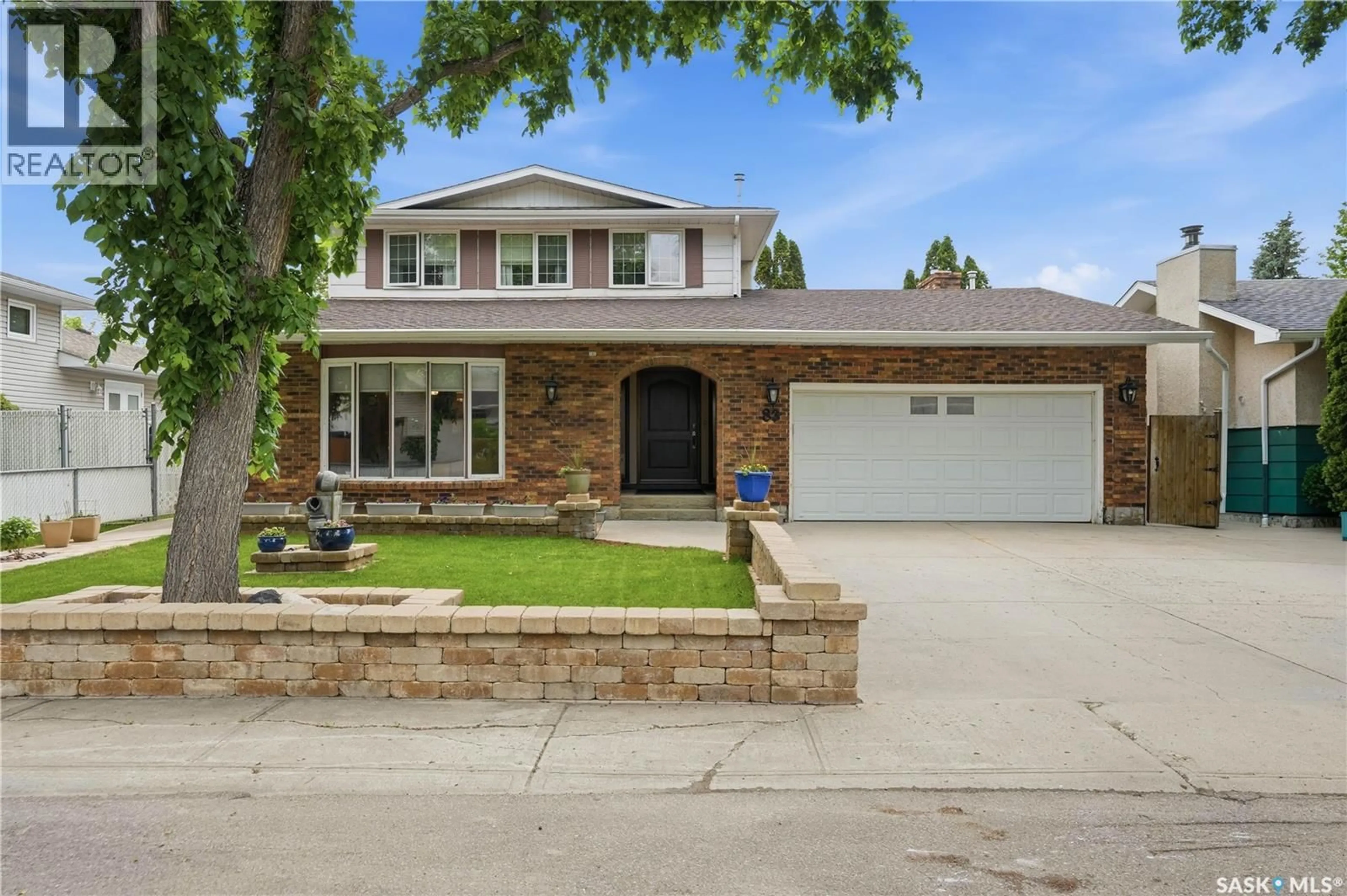 Home with brick exterior material, street for 83 MINOT DRIVE, Regina Saskatchewan S4X1B6