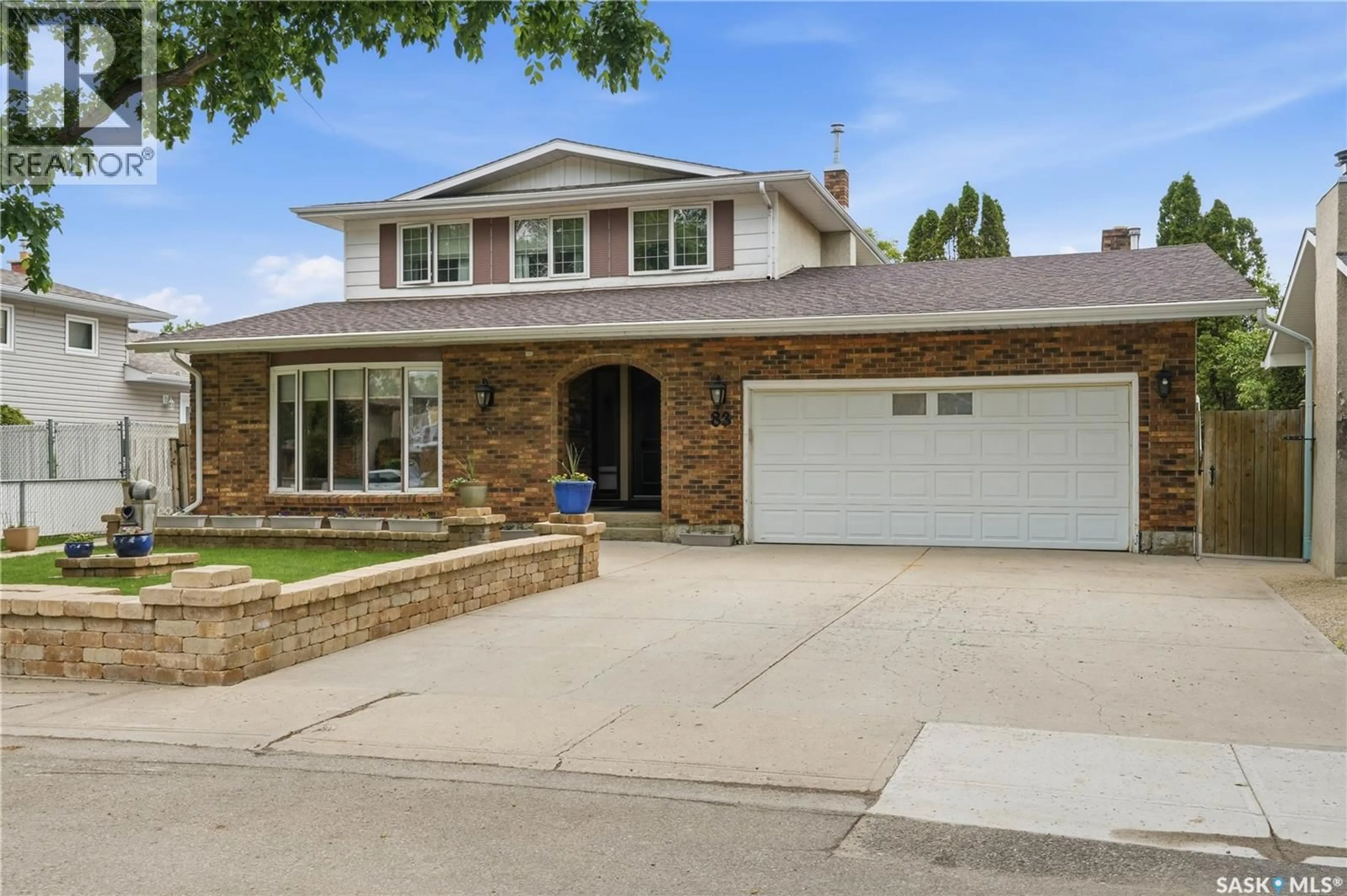Home with brick exterior material, street for 83 MINOT DRIVE, Regina Saskatchewan S4X1B6