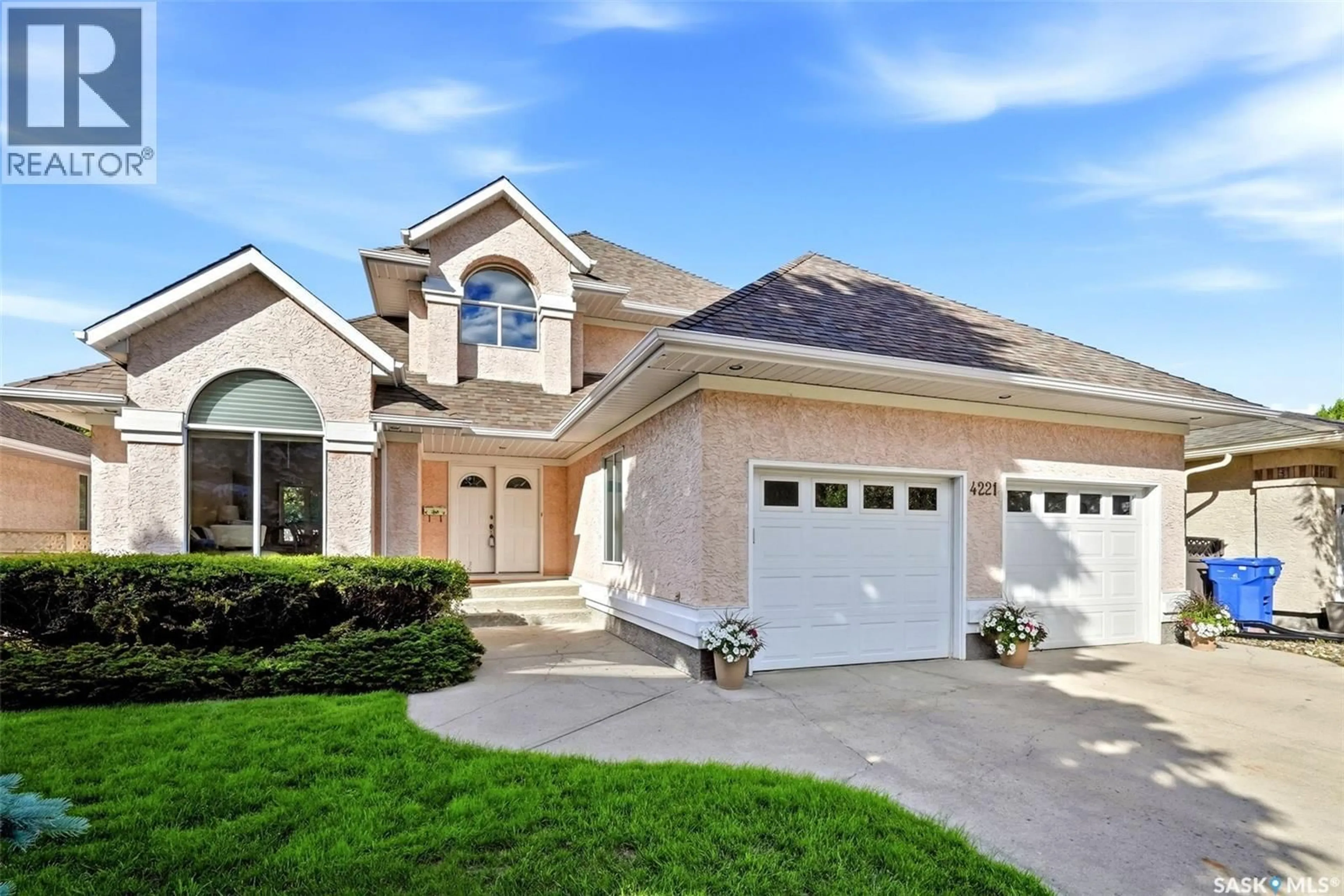Home with vinyl exterior material, street for 4221 WASCANA RIDGE, Regina Saskatchewan S4V2T1