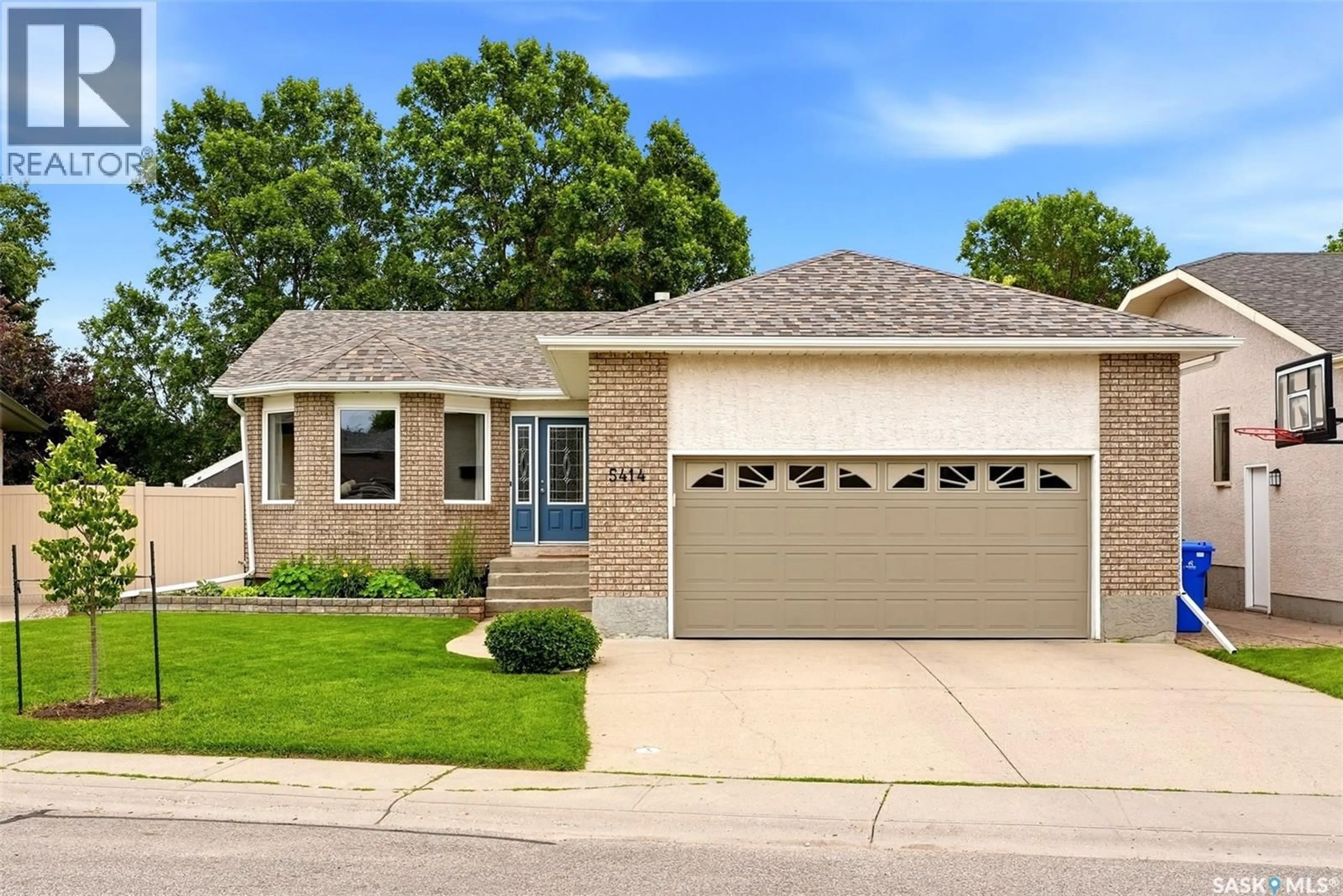 Home with vinyl exterior material, street for 5414 BALLANTINE COURT, Regina Saskatchewan S4X4K4