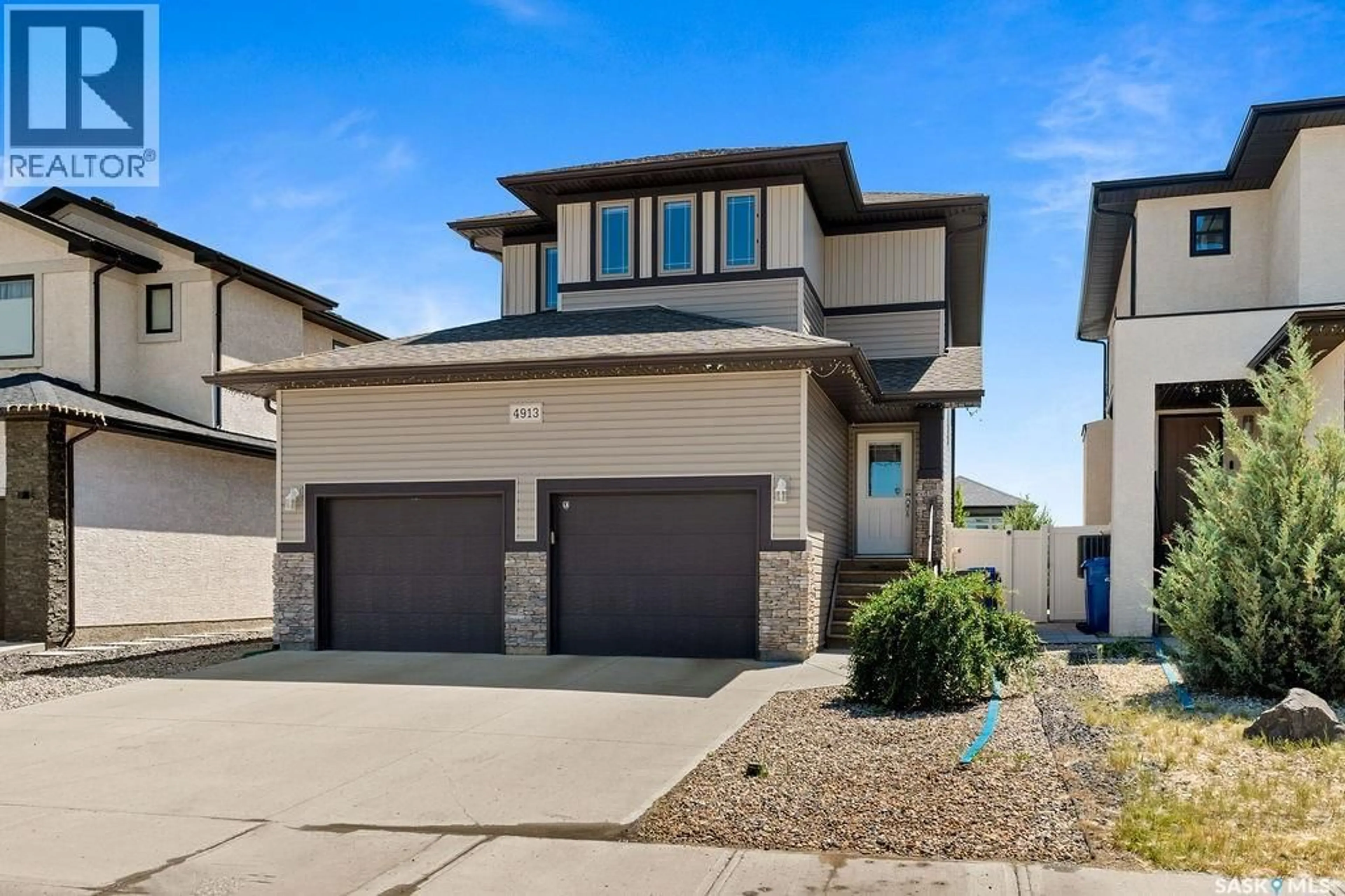 Home with vinyl exterior material, street for E - 4913 GREEN BROOKS WAY, Regina Saskatchewan S4V3K5
