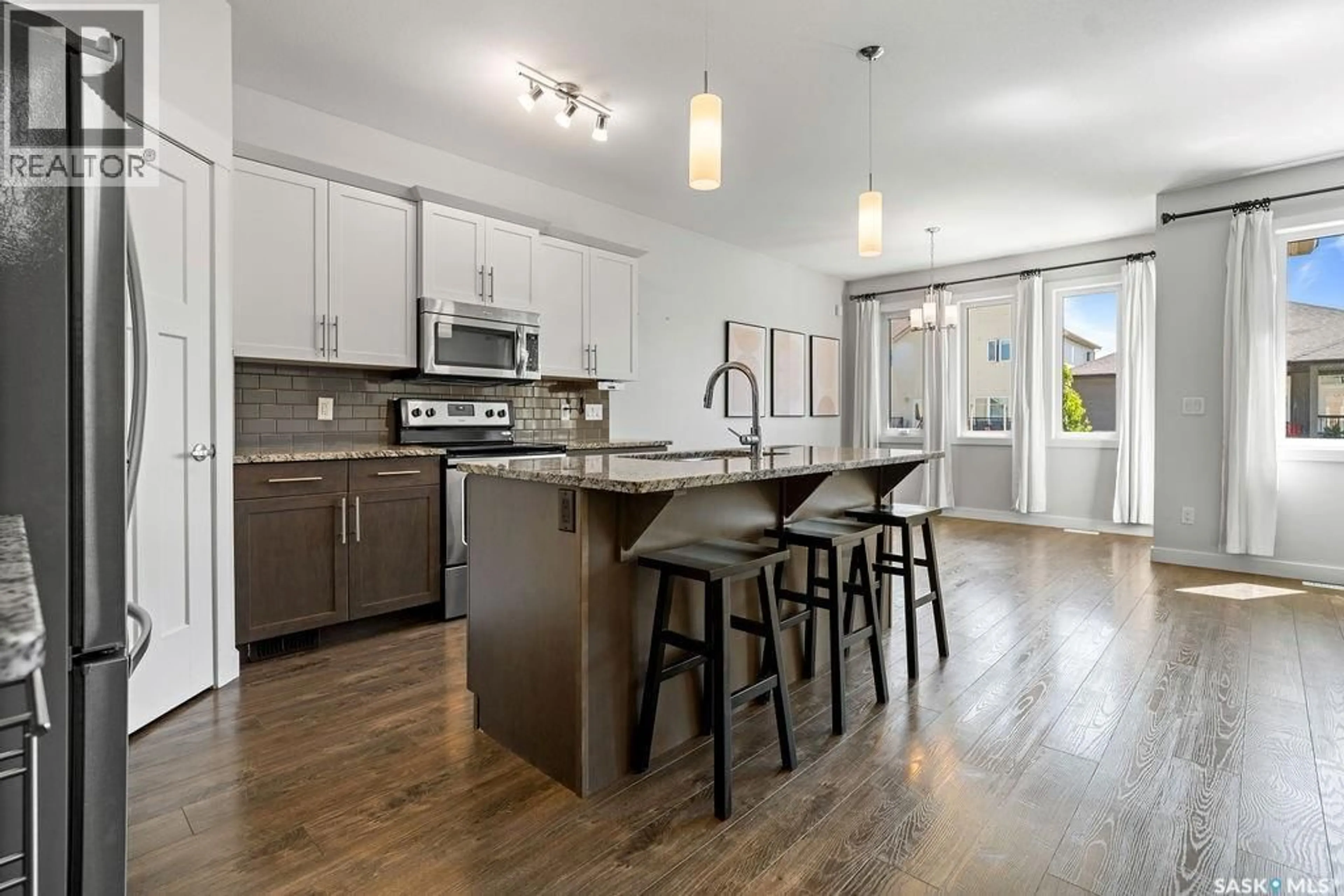 Open concept kitchen, unknown for E - 4913 GREEN BROOKS WAY, Regina Saskatchewan S4V3K5