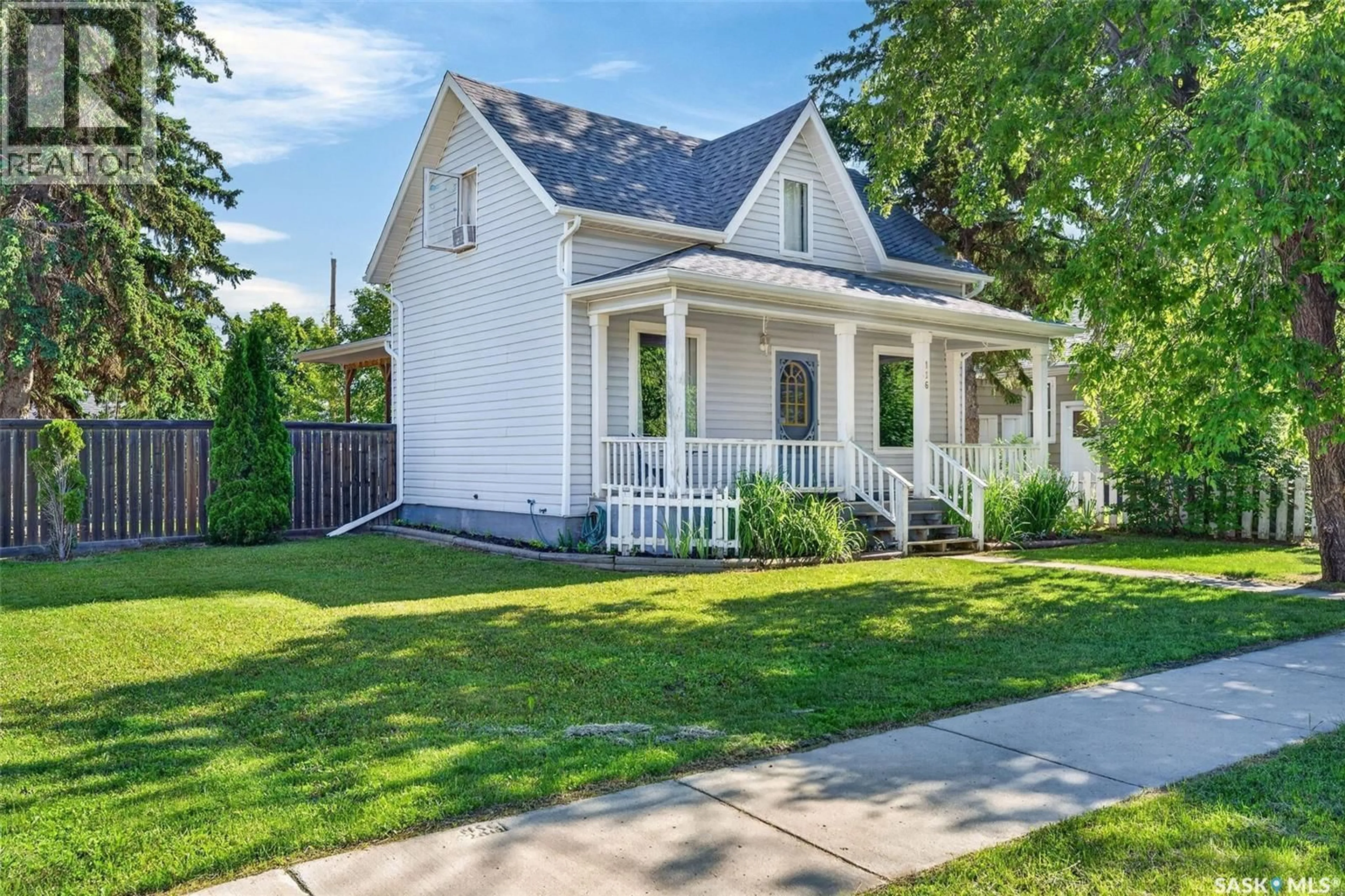 Home with vinyl exterior material, street for 116 STOVEL AVENUE, Melfort Saskatchewan S0E1A0