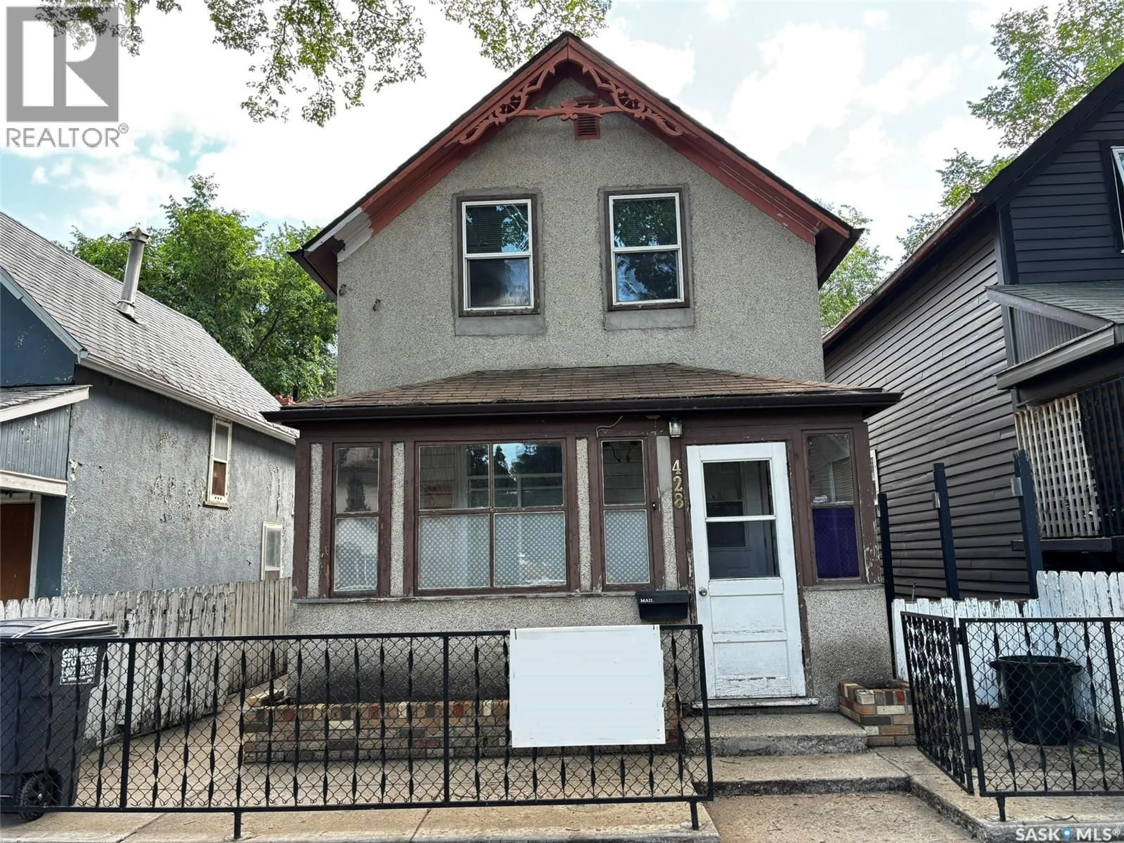 Home with vinyl exterior material, street for 428 I AVENUE, Saskatoon Saskatchewan S7M1Y4
