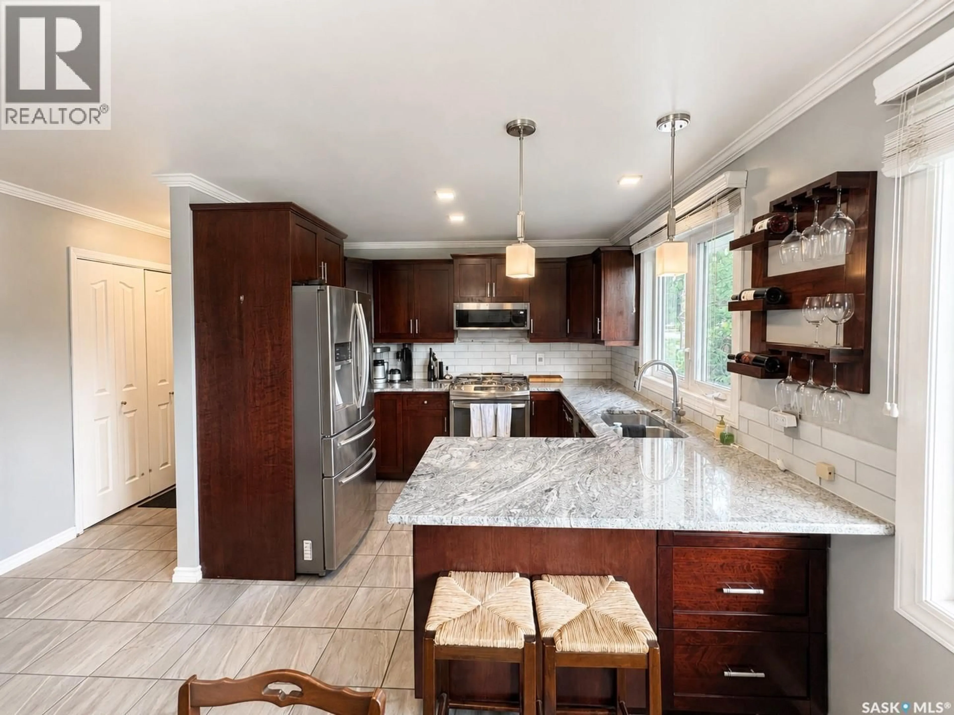 Open concept kitchen, ceramic/tile floor for 722 6TH AVENUE, Rosthern Saskatchewan S0K3R0