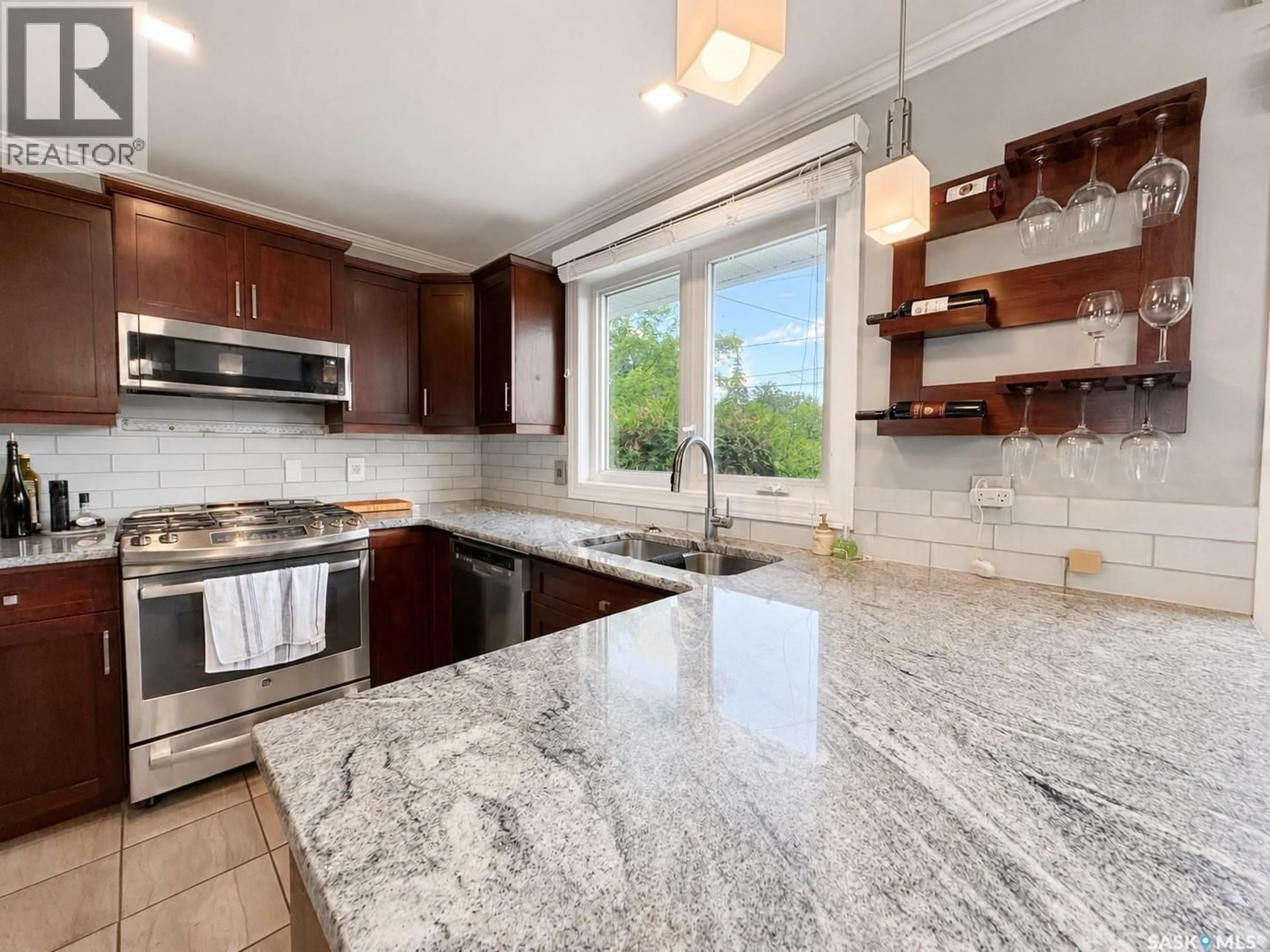 Open concept kitchen, ceramic/tile floor for 722 6TH AVENUE, Rosthern Saskatchewan S0K3R0
